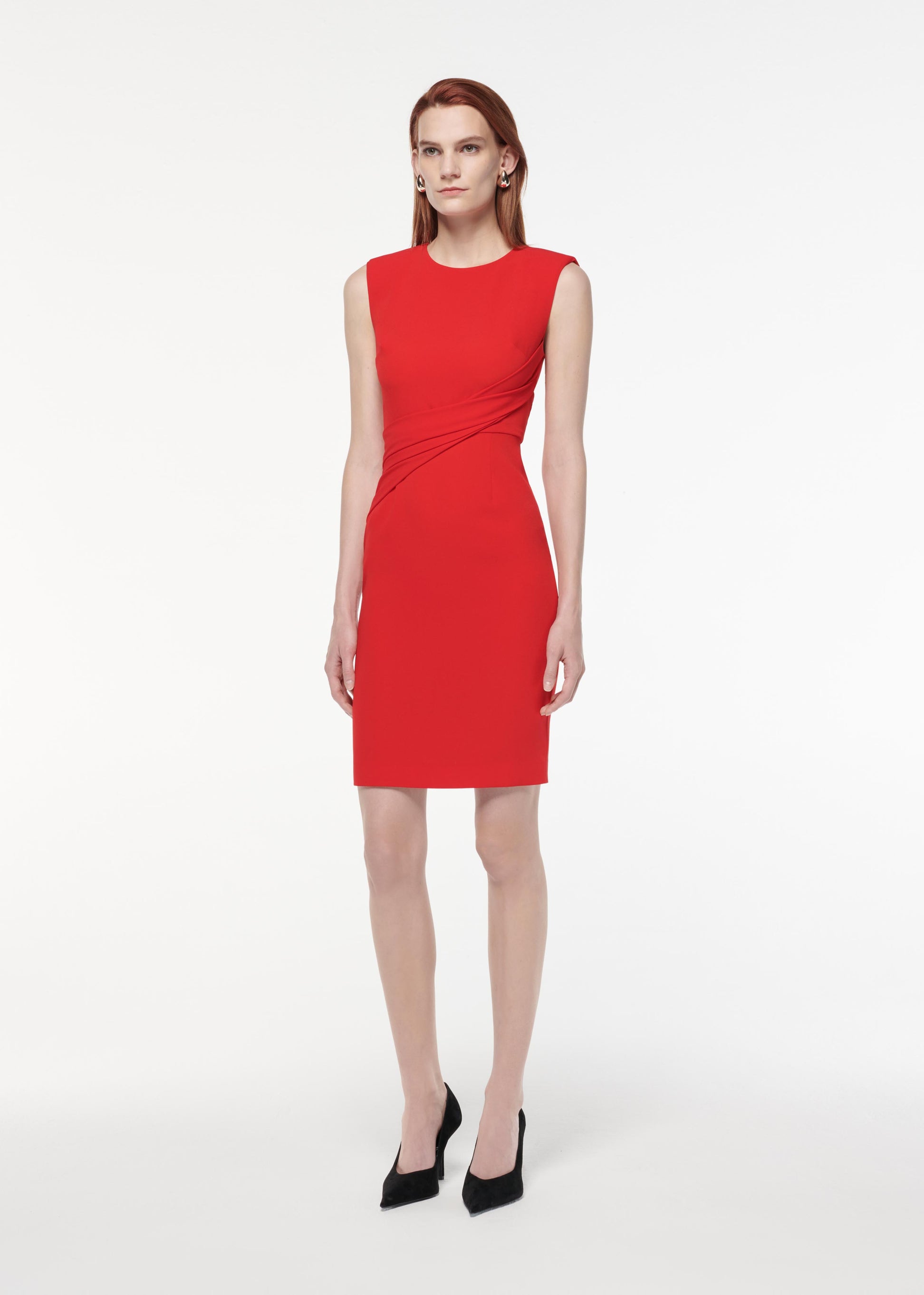 A photograph of a woman wearing a Satin Crepe Midi Dress in Red