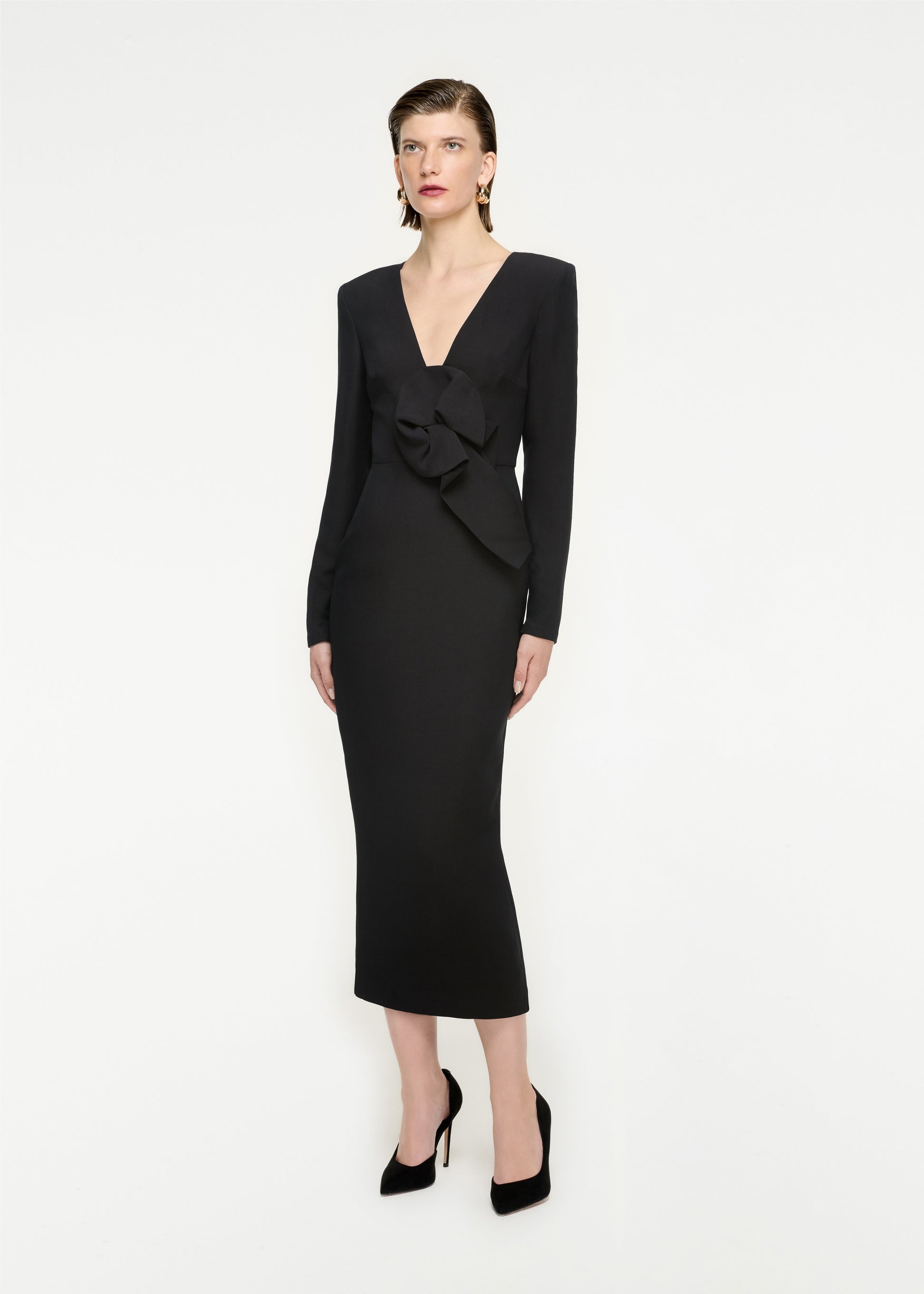 Woman wearing the Long Sleeve Wool Silk Midi Dress in Black