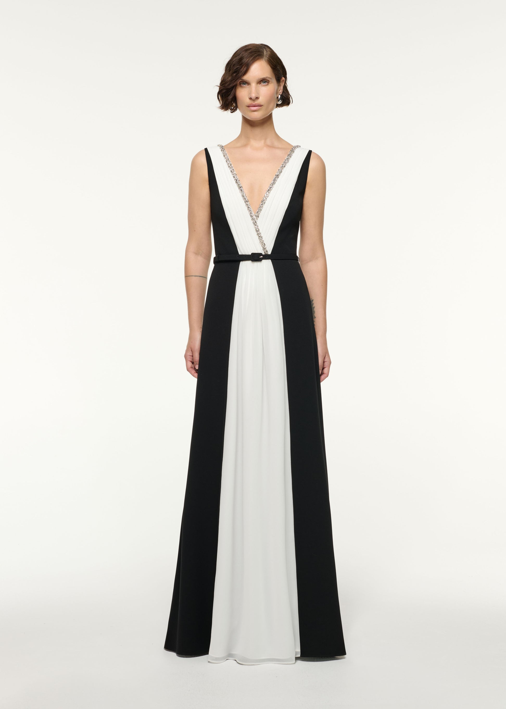 Front view of a model wearing the Crystal Neckline Monochrome Gathered Gown in Monochrome