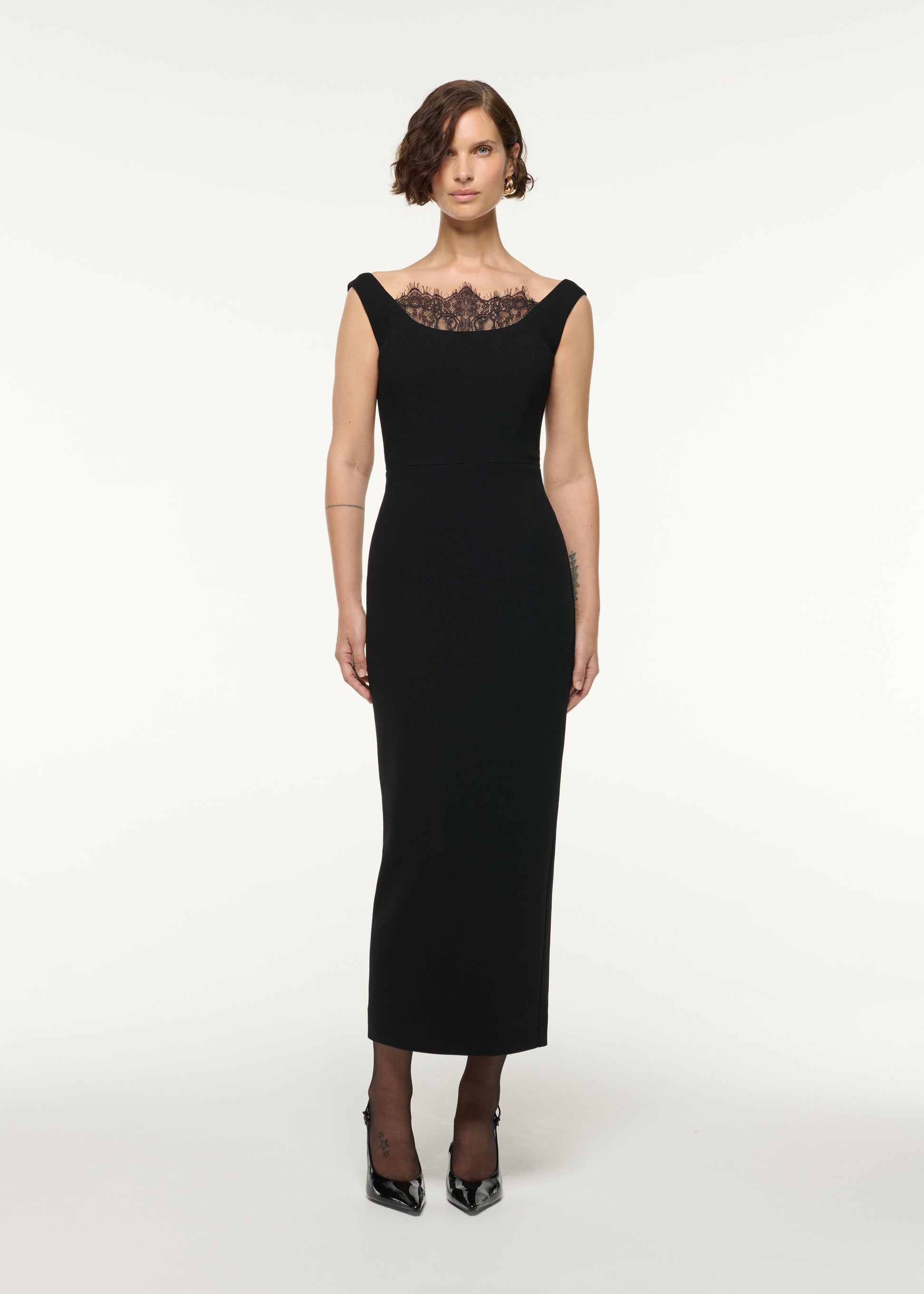 Front view of a model wearing the Scallop Lace Insert Wool Cocktail Dress in Black