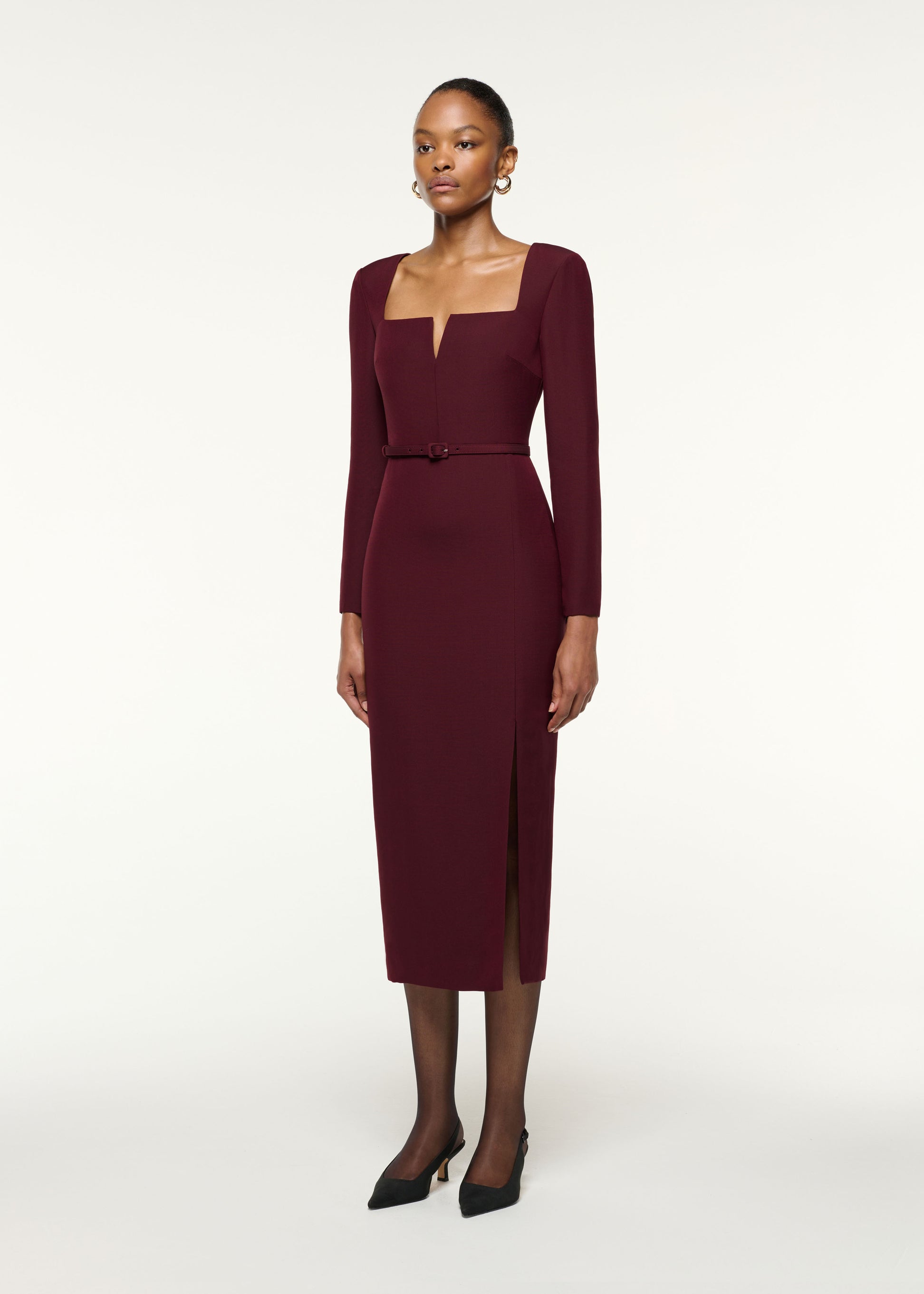 Side view of a model wearing the Cutout Square Neck Wool Silk Dress in Mulberry