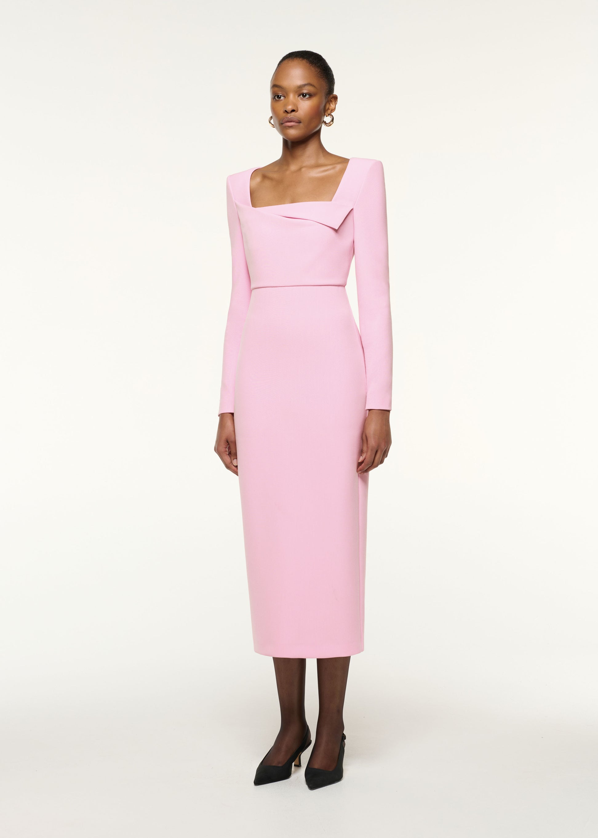 Side view of a model wearing the Origami Square Neckline Column Dress in Pink