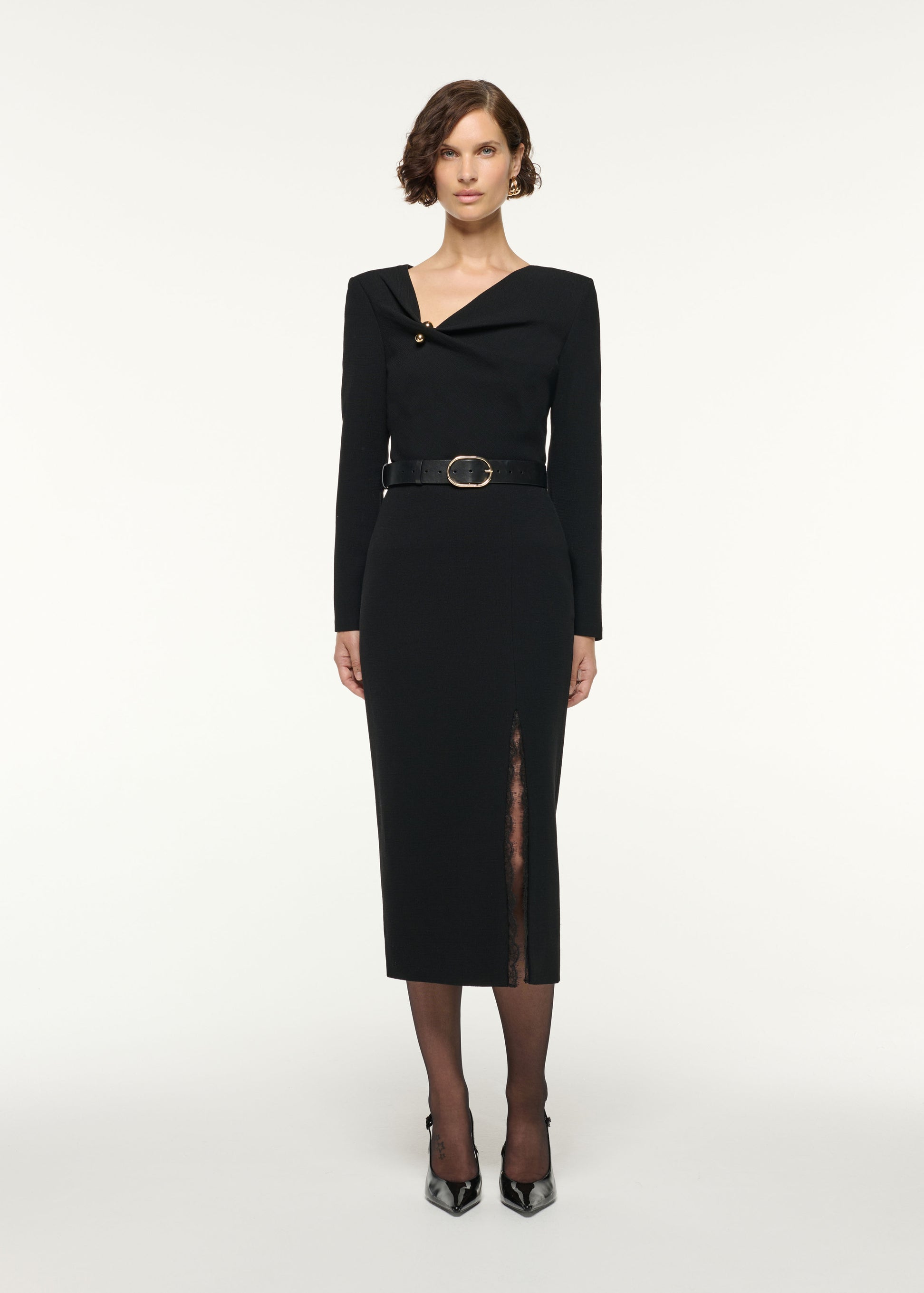 Front view of a model wearing the Asymmetrical Draped Neck Wool Top in Black