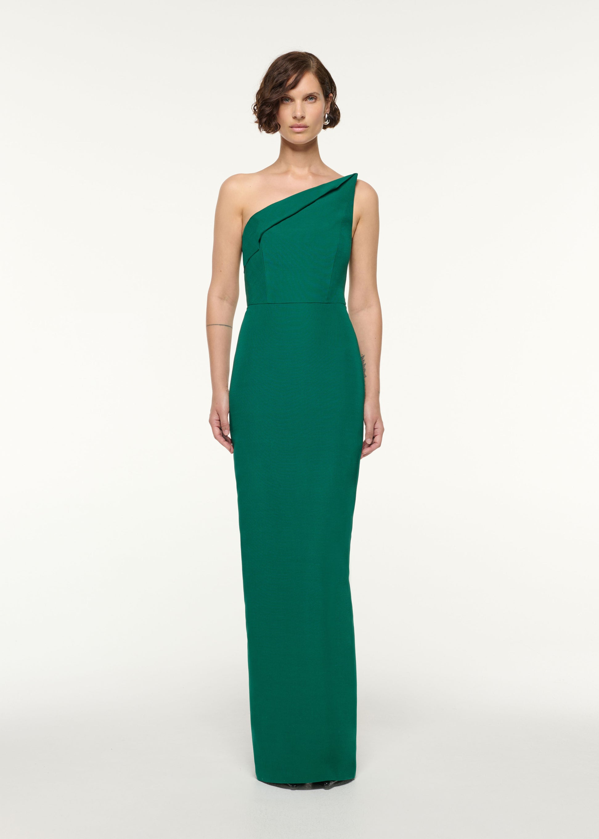Front view of a model wearing the Asymmetrical Fold Wool Silk Gown in Green