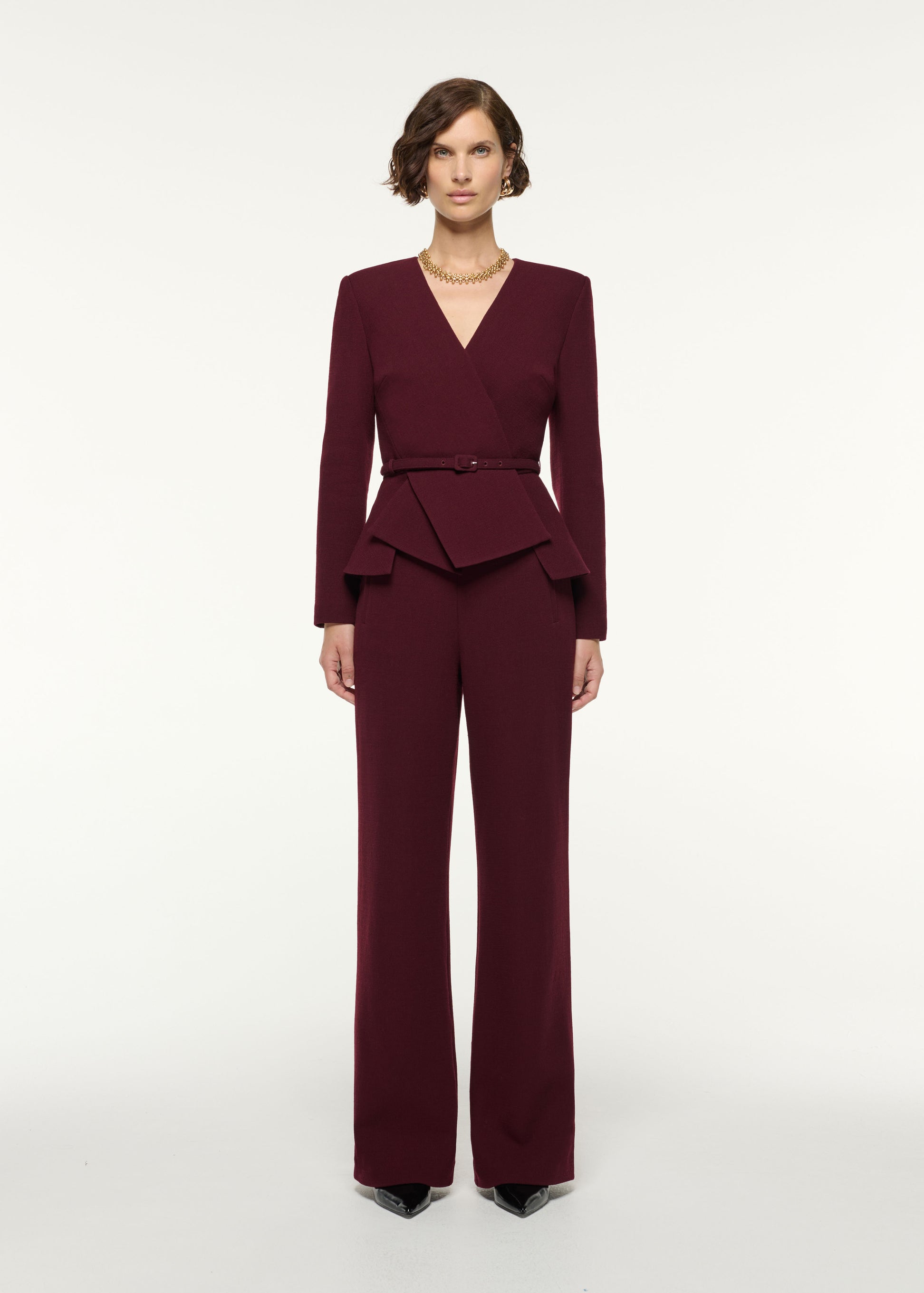 Front view of a model wearing the Tailored Wool Wide Leg Trouser in Mulberry