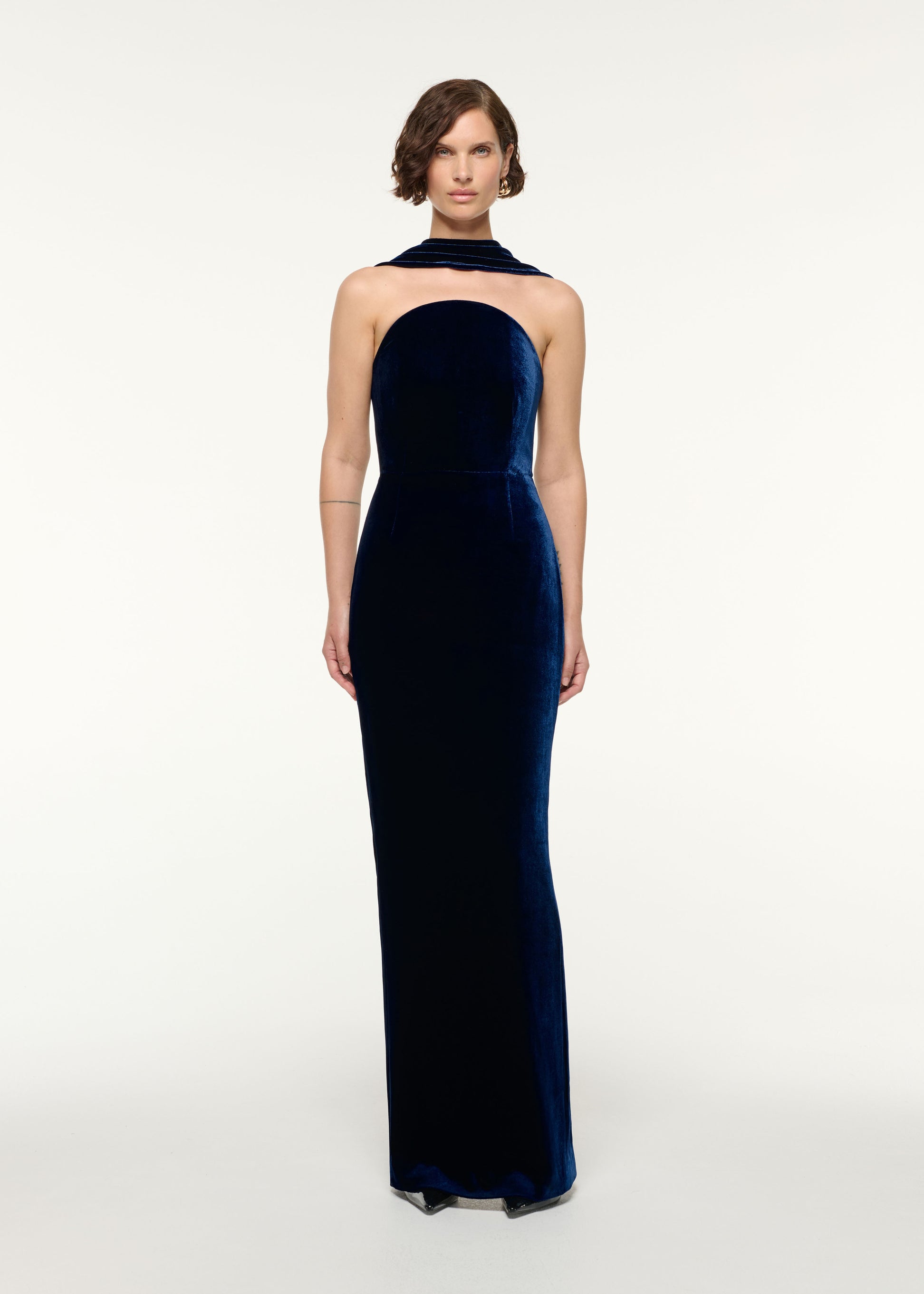 Front view of a model wearing the Scarf Neckline Velvet Moon Gown in Navy