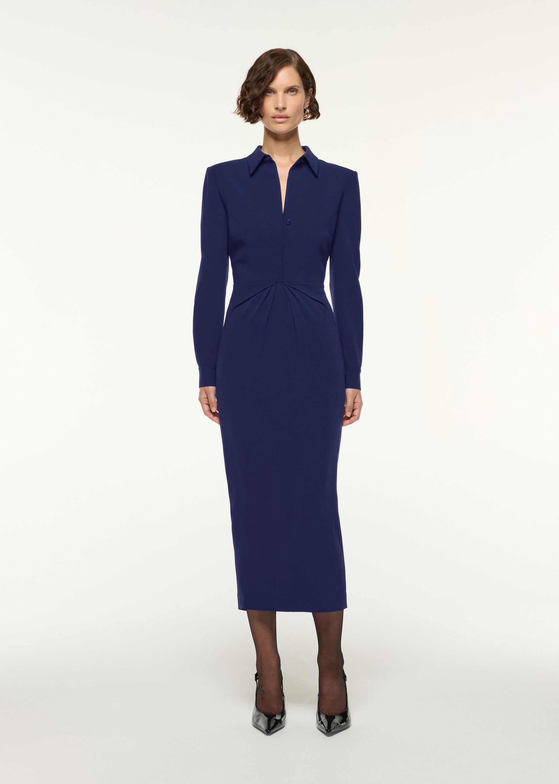 Front view of a model wearing the Gathered Drape Hip Midi Dress in Navy