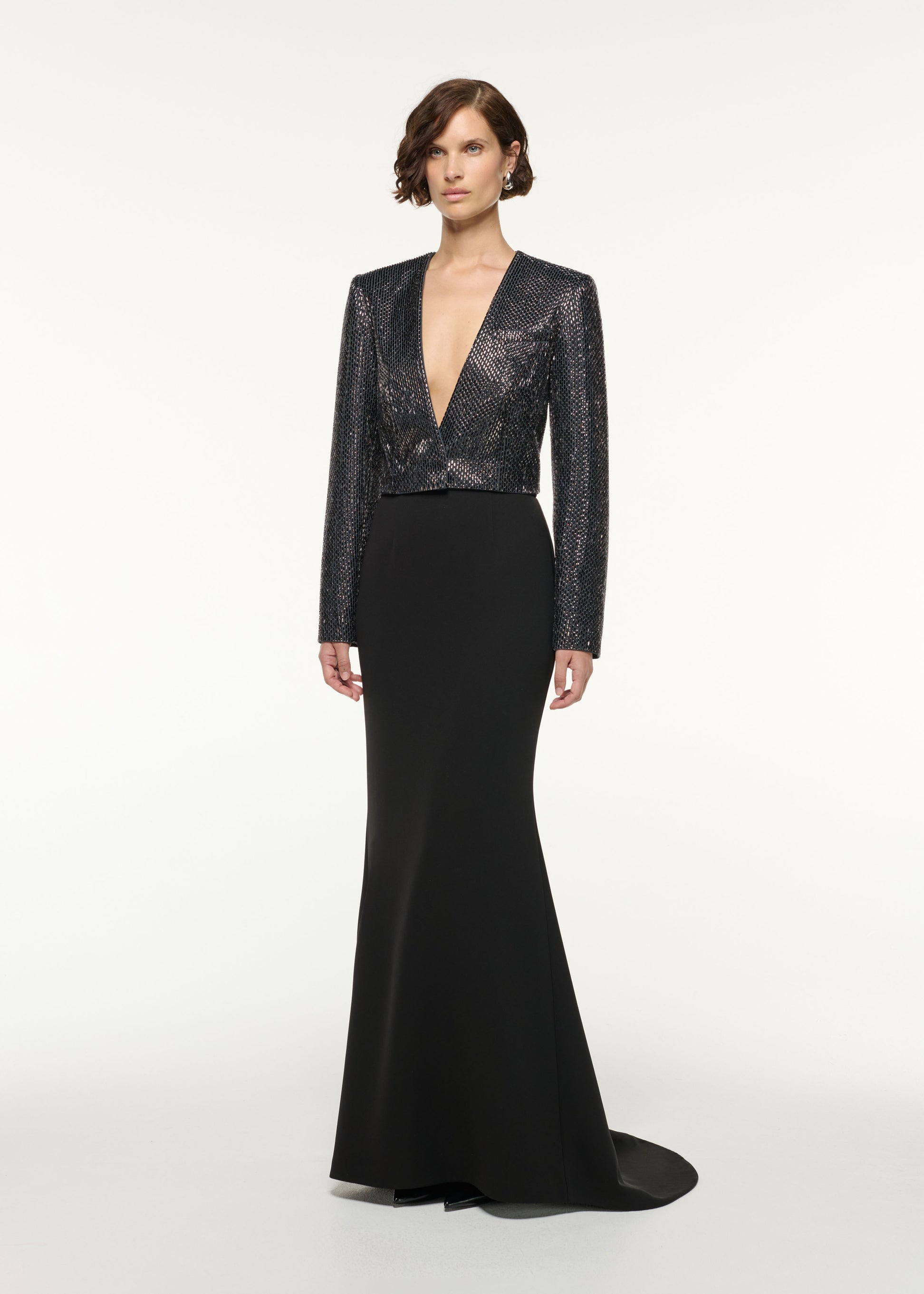 Side view of a model wearing the Structured Diamante Cropped Jacket in Grey