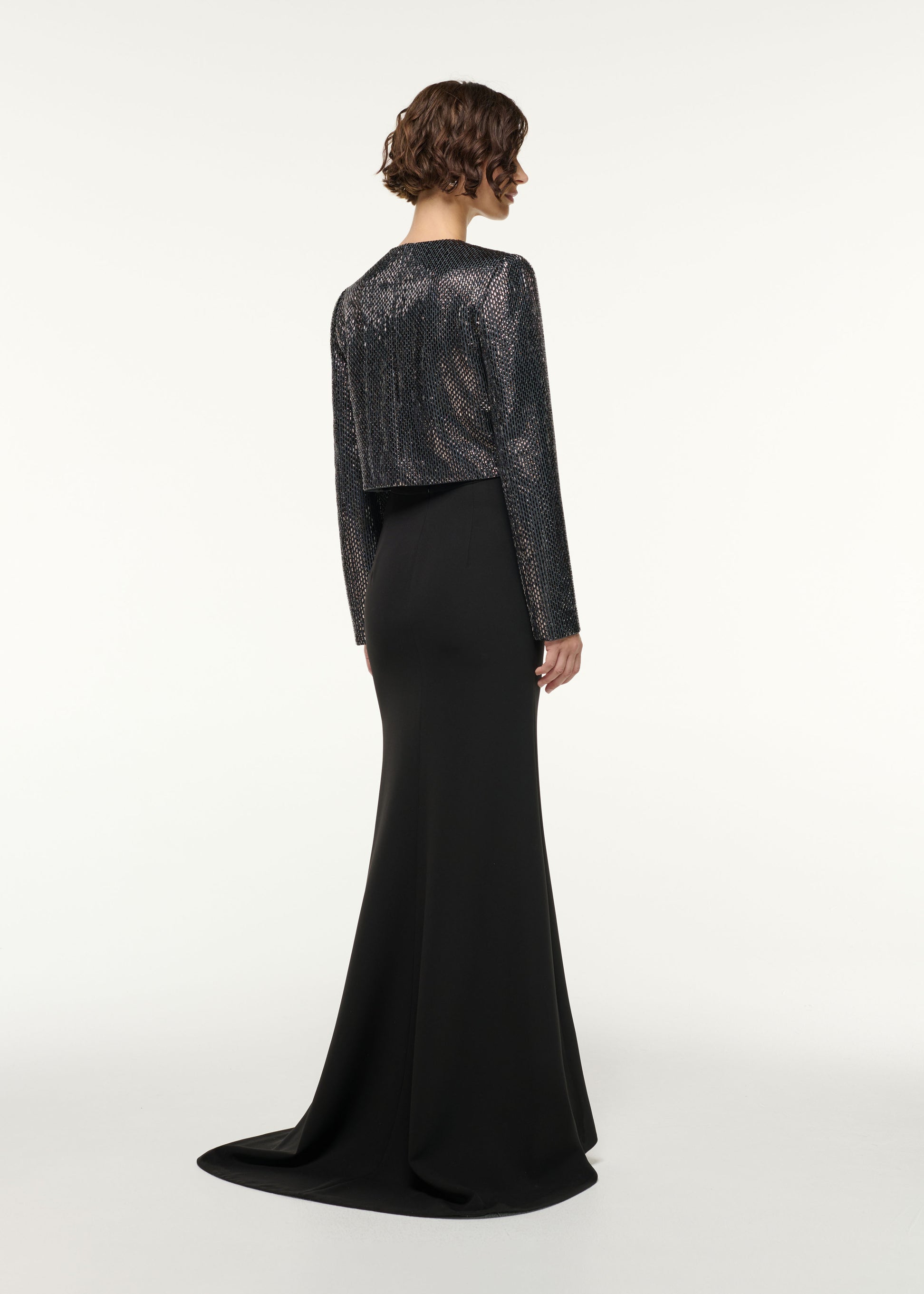 Back view of a model wearing the Structured Diamante Cropped Jacket in Grey