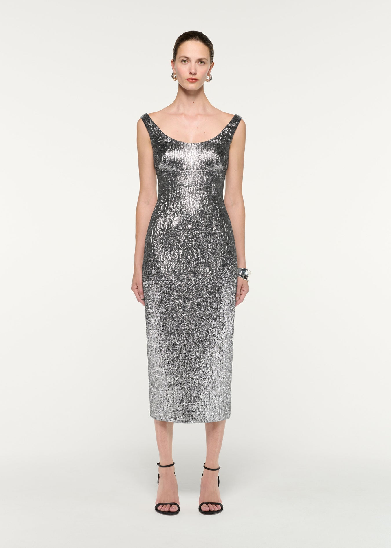 Front view of a model wearing the Metallic Jaquard Column Midi Dress