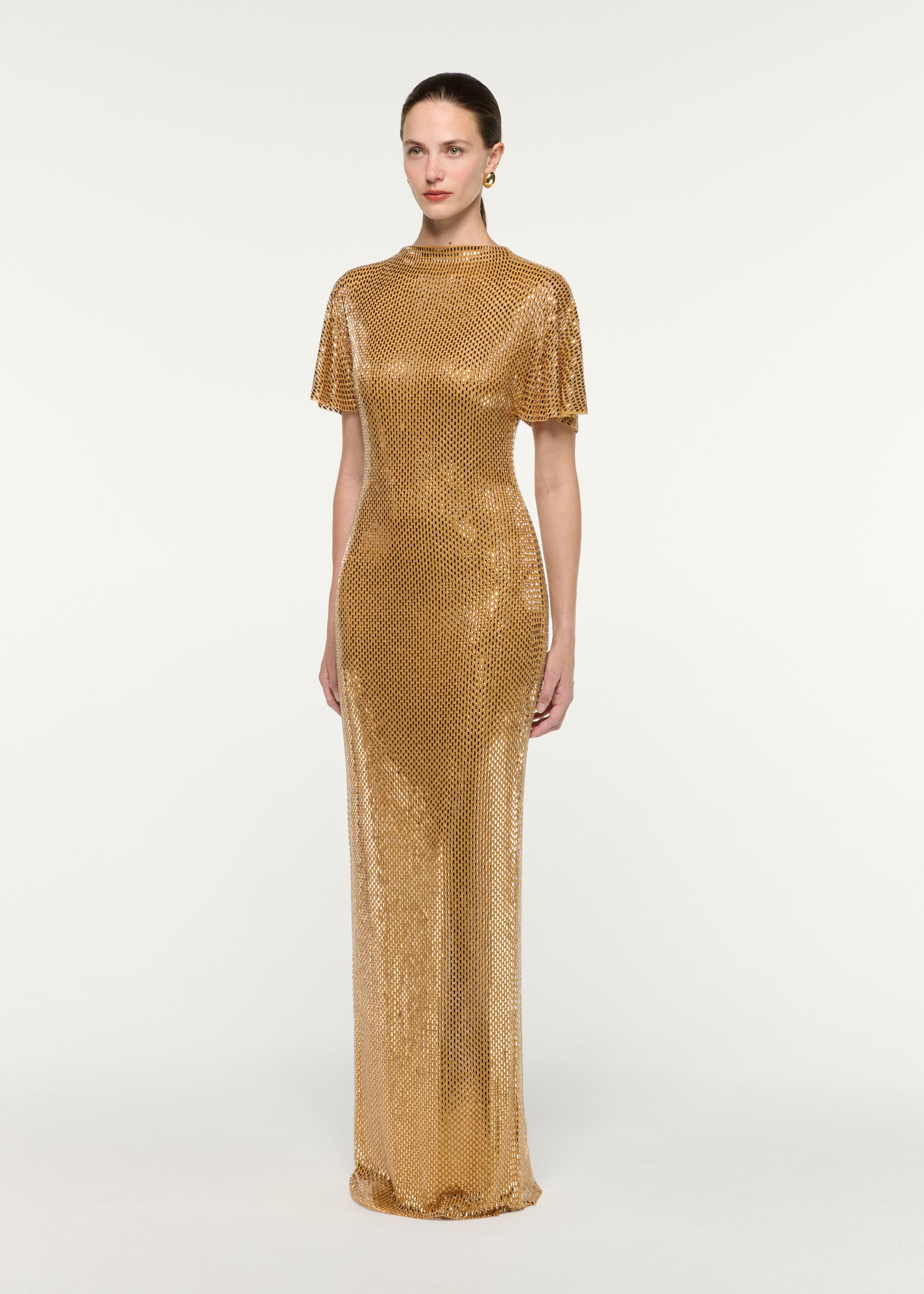 Side view of a model wearing the High Neck Diamante Short Sleeve Gown