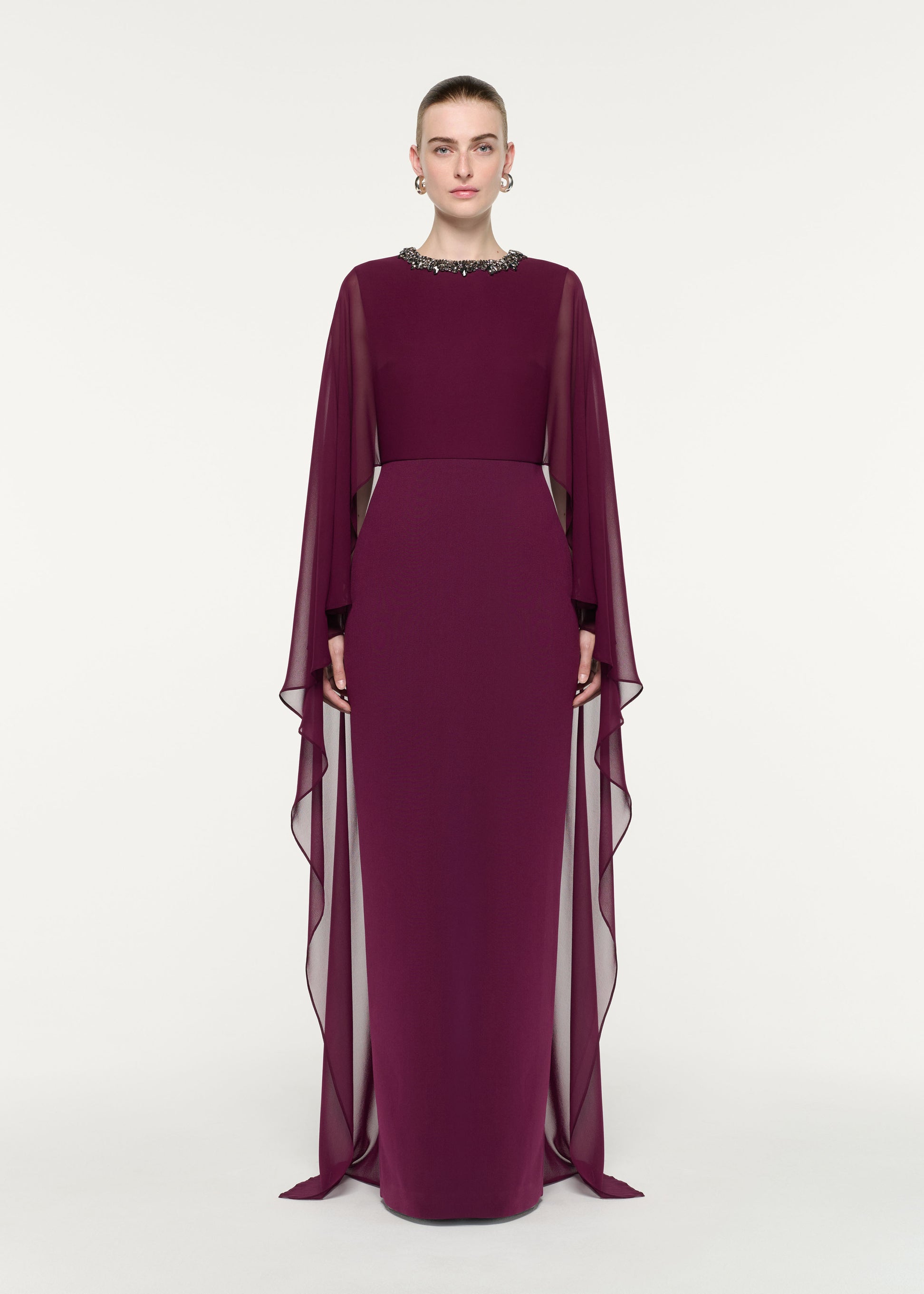 Front view of a model wearing the Embellished Chiffon Cape Gown
