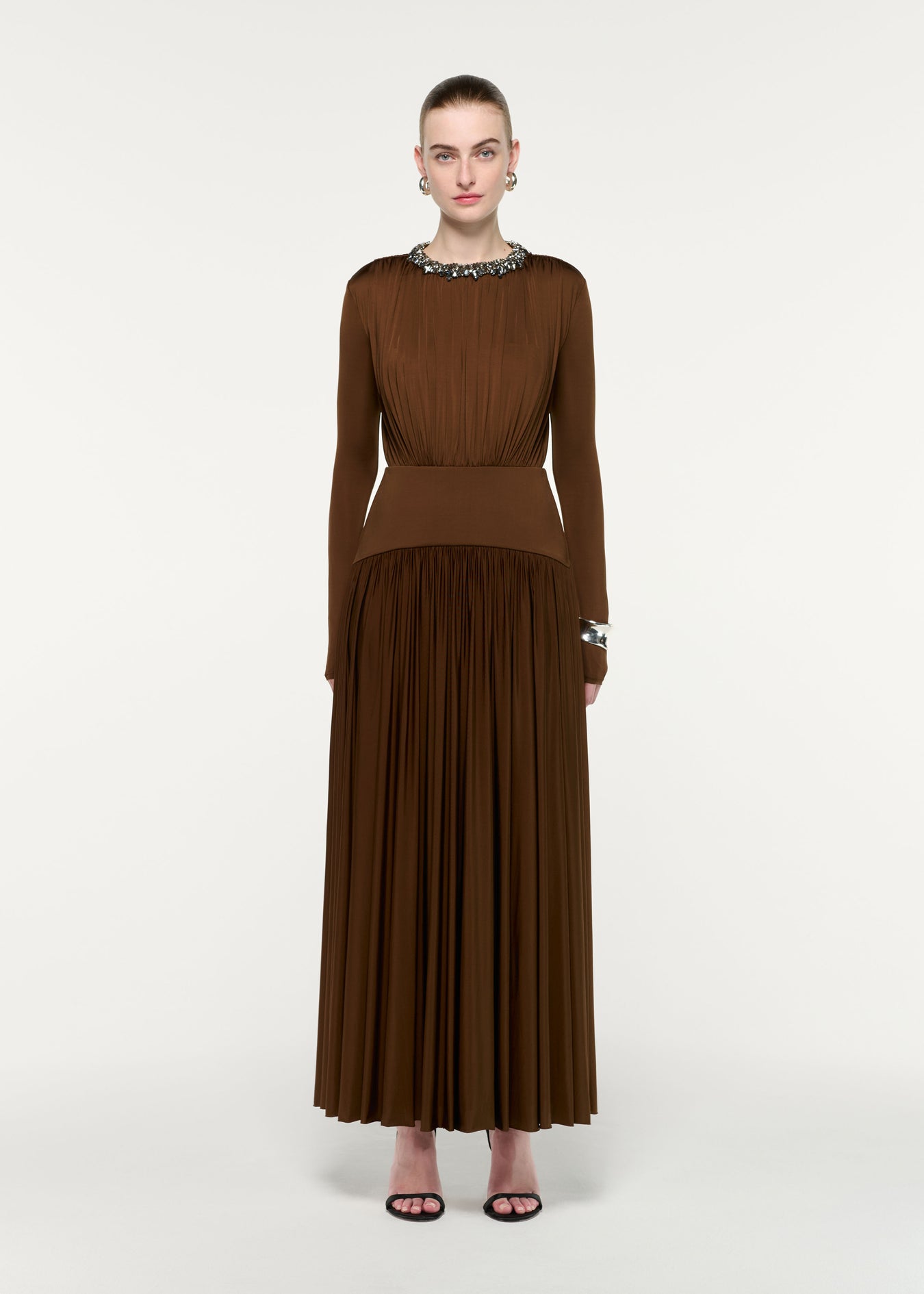 Front view of a model wearing the Embellished Neck Long Sleeve Gathered Dress