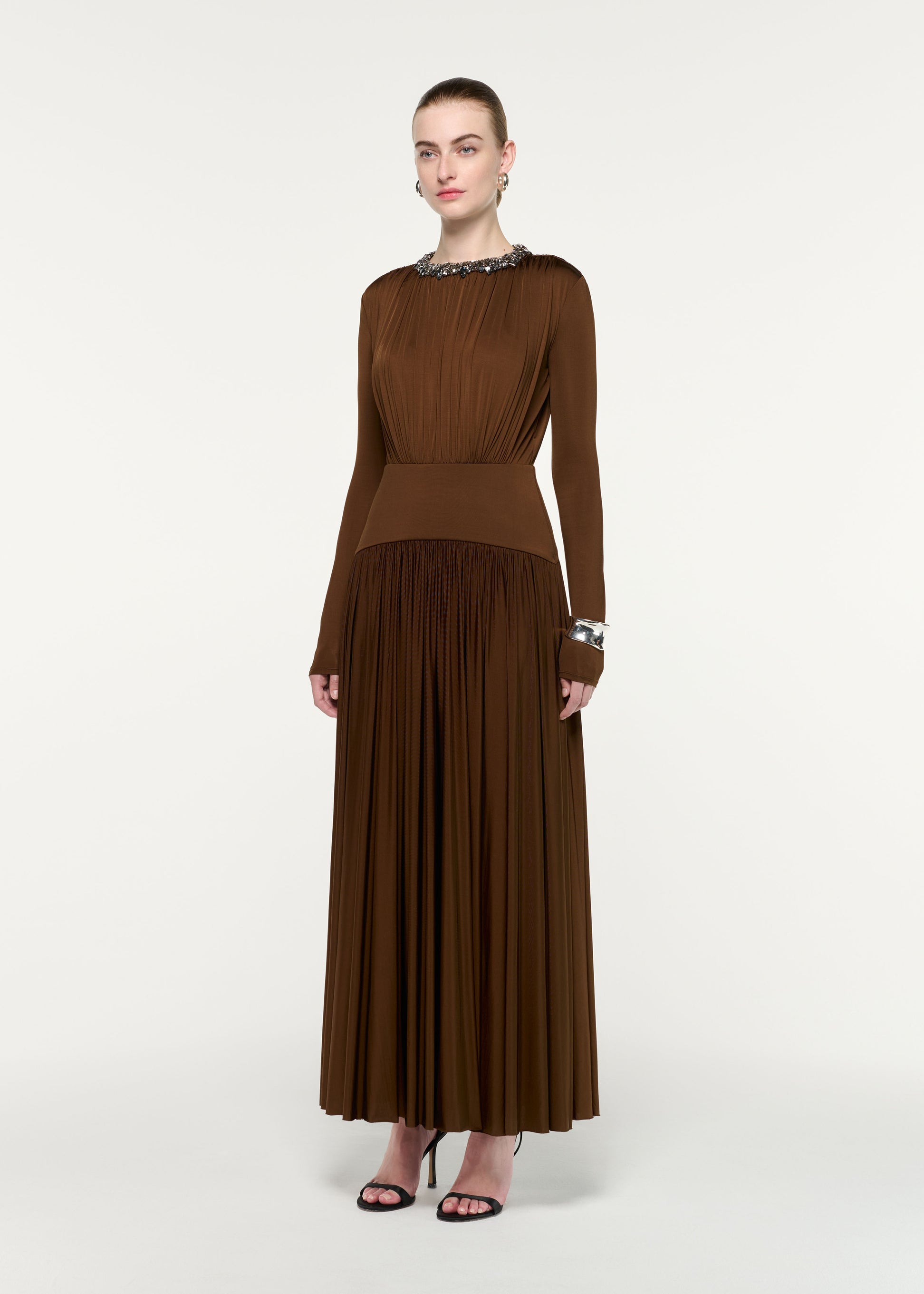 Side view of a model wearing the Embellished Neck Long Sleeve Gathered Dress