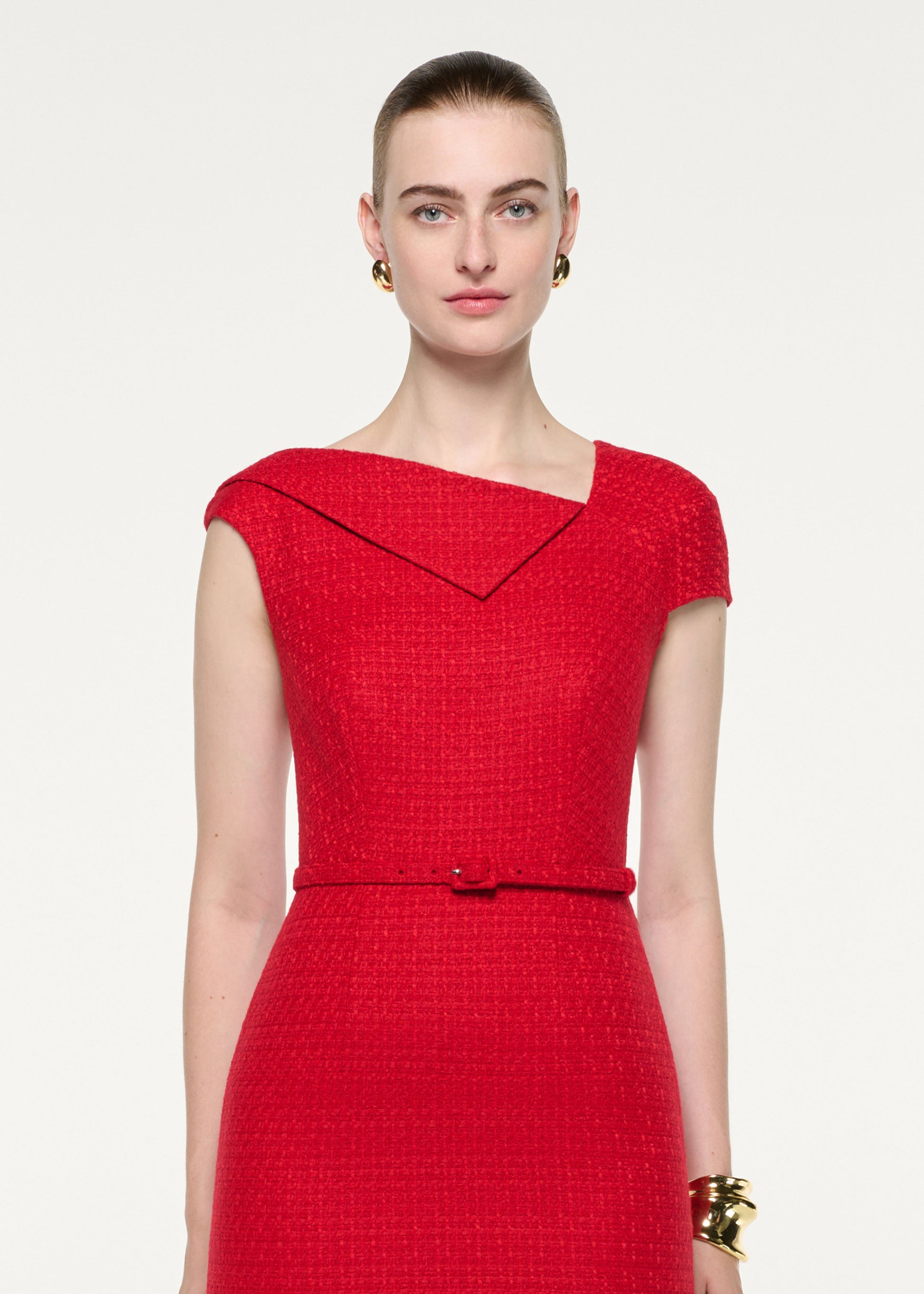 Close up of a model wearing the Asymmetric Neckline Boucle Midi Dress