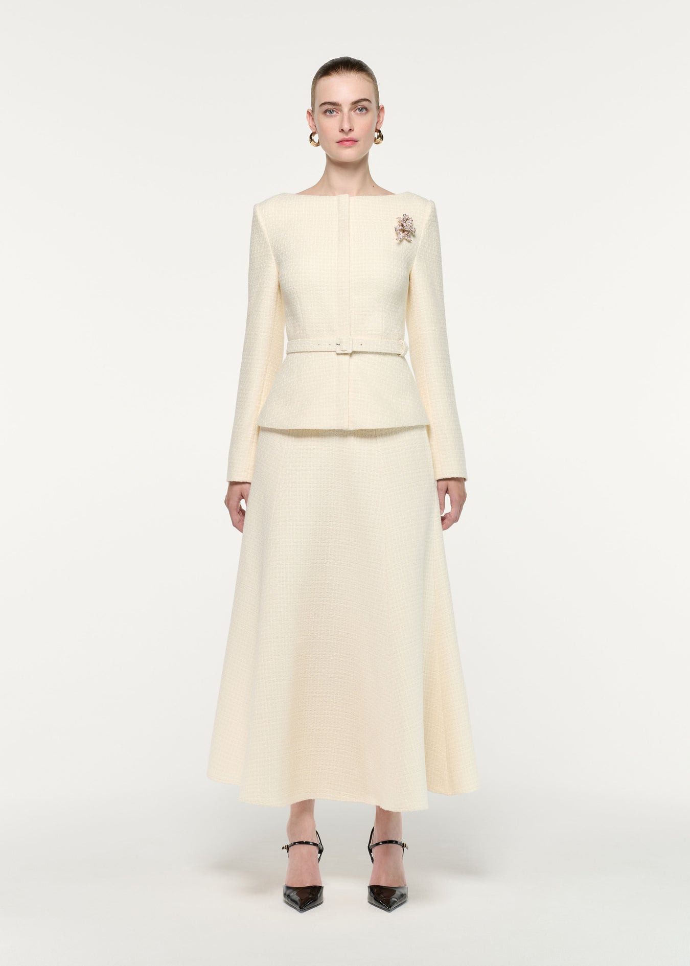 Front view of a model wearing the Boucle Midi Flared Skirt
