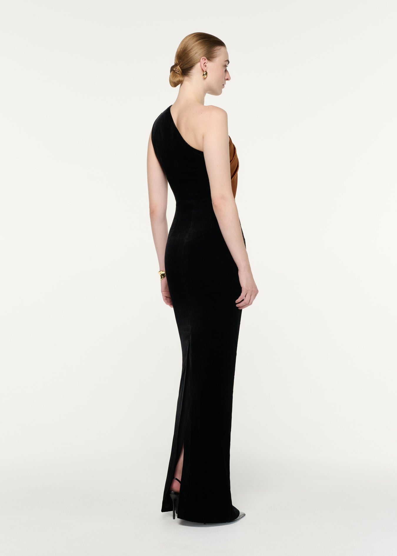 Back view of a model wearing the Satin Bow One Shoulder Velvet Gown