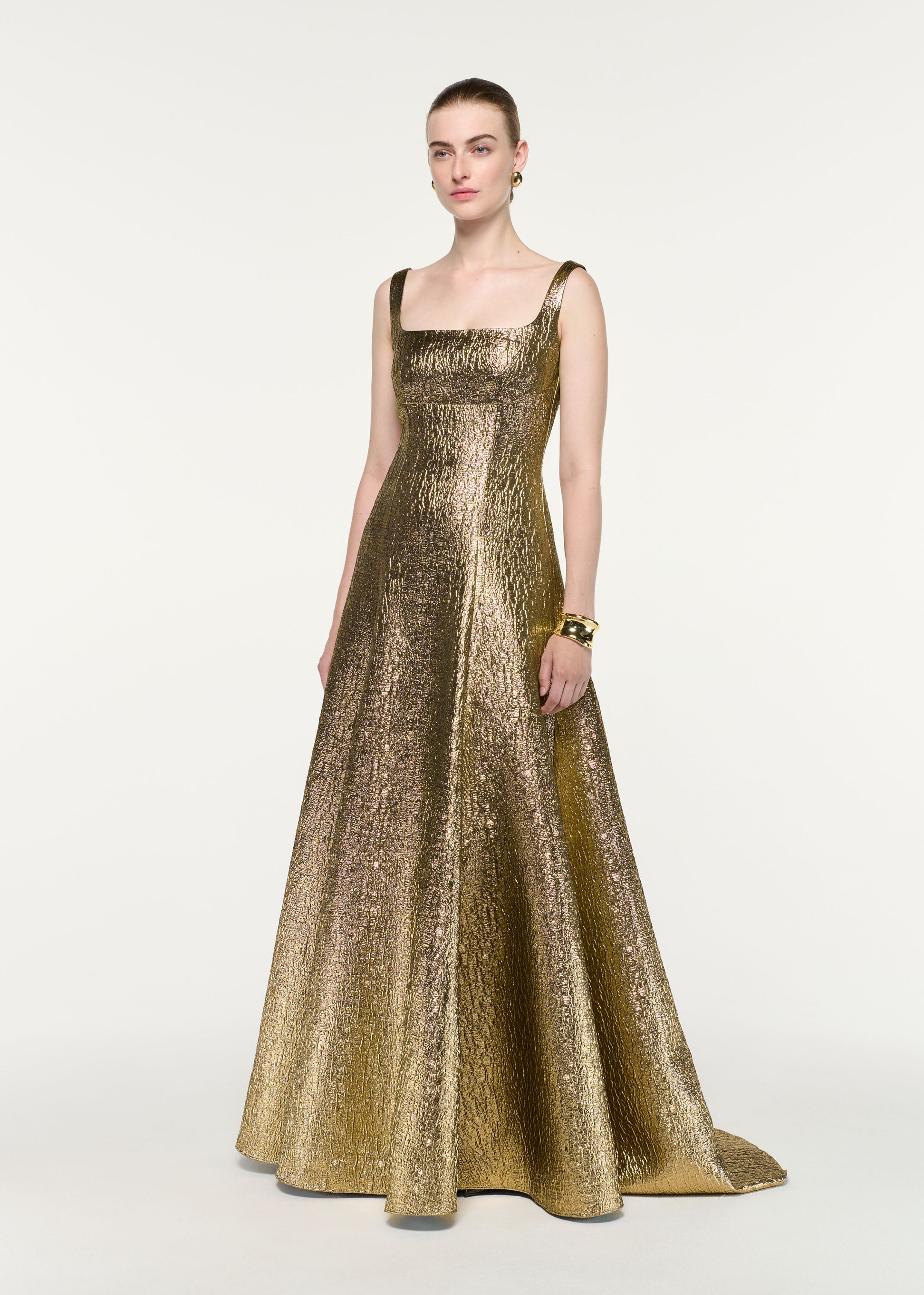Side view of a model wearing the Metallic Jacquard Square Neck Gown