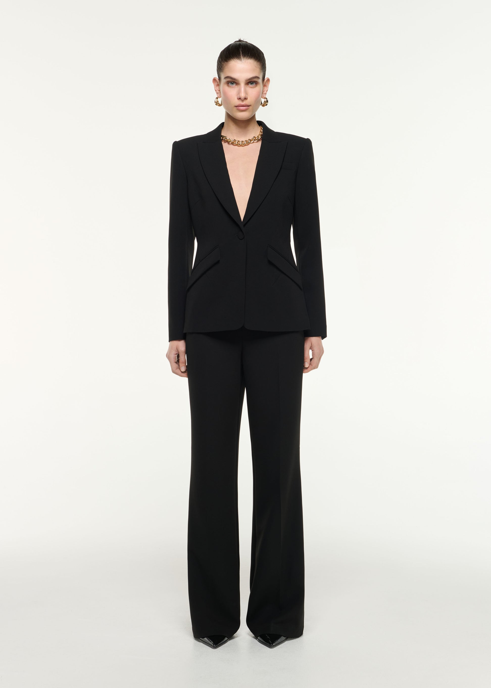 Front view of a model wearing the Wide Leg Heavy Cady Trouser in Black