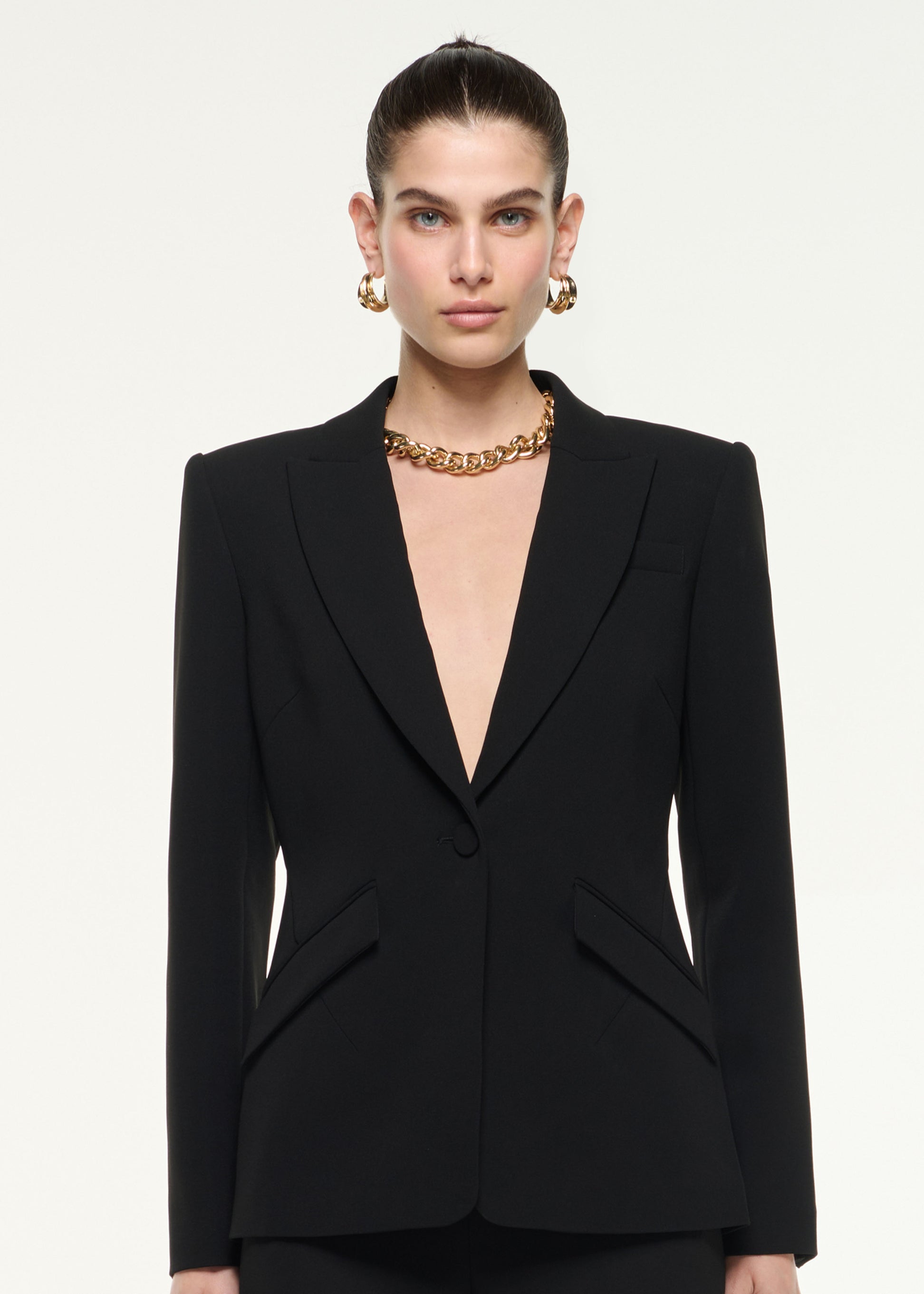 Close up of a model wearing the Single Breasted Blazer in Black