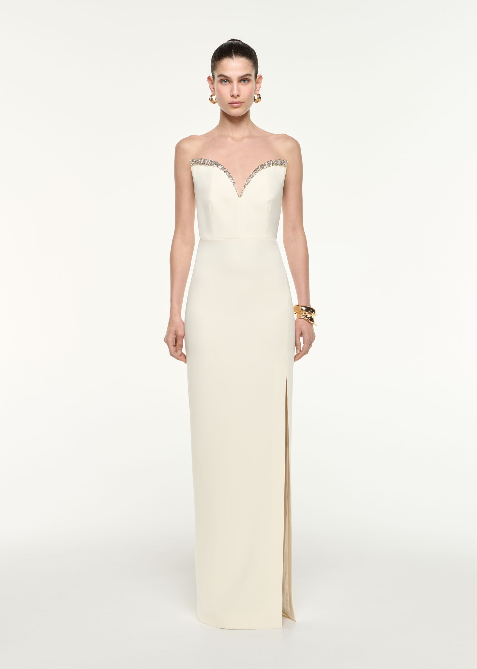 Front view of a model wearing the Diamante Sweetheart Strapless Gown in Cream