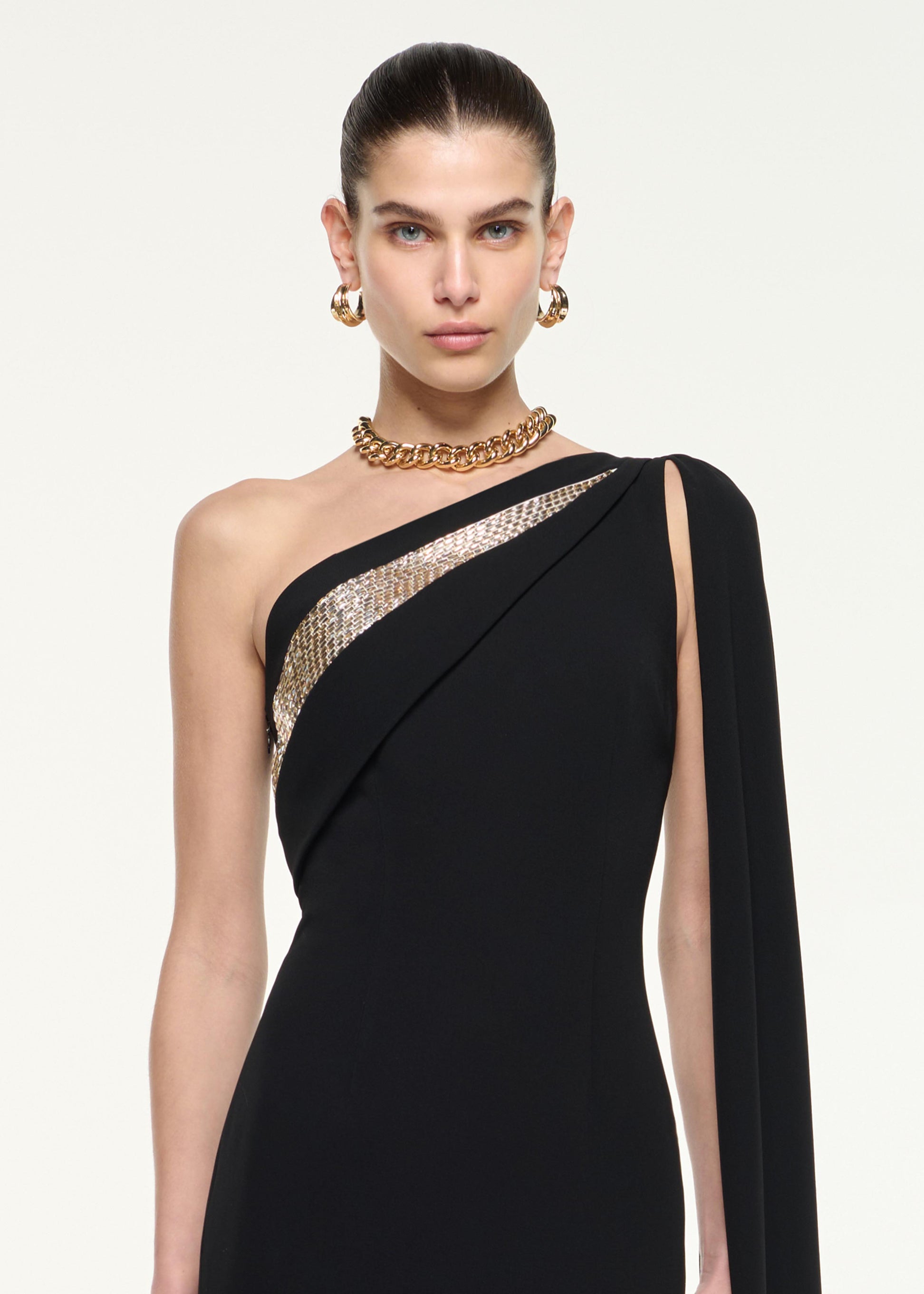 Close up of a model wearing the One Shoulder Diamante Gown in Black
