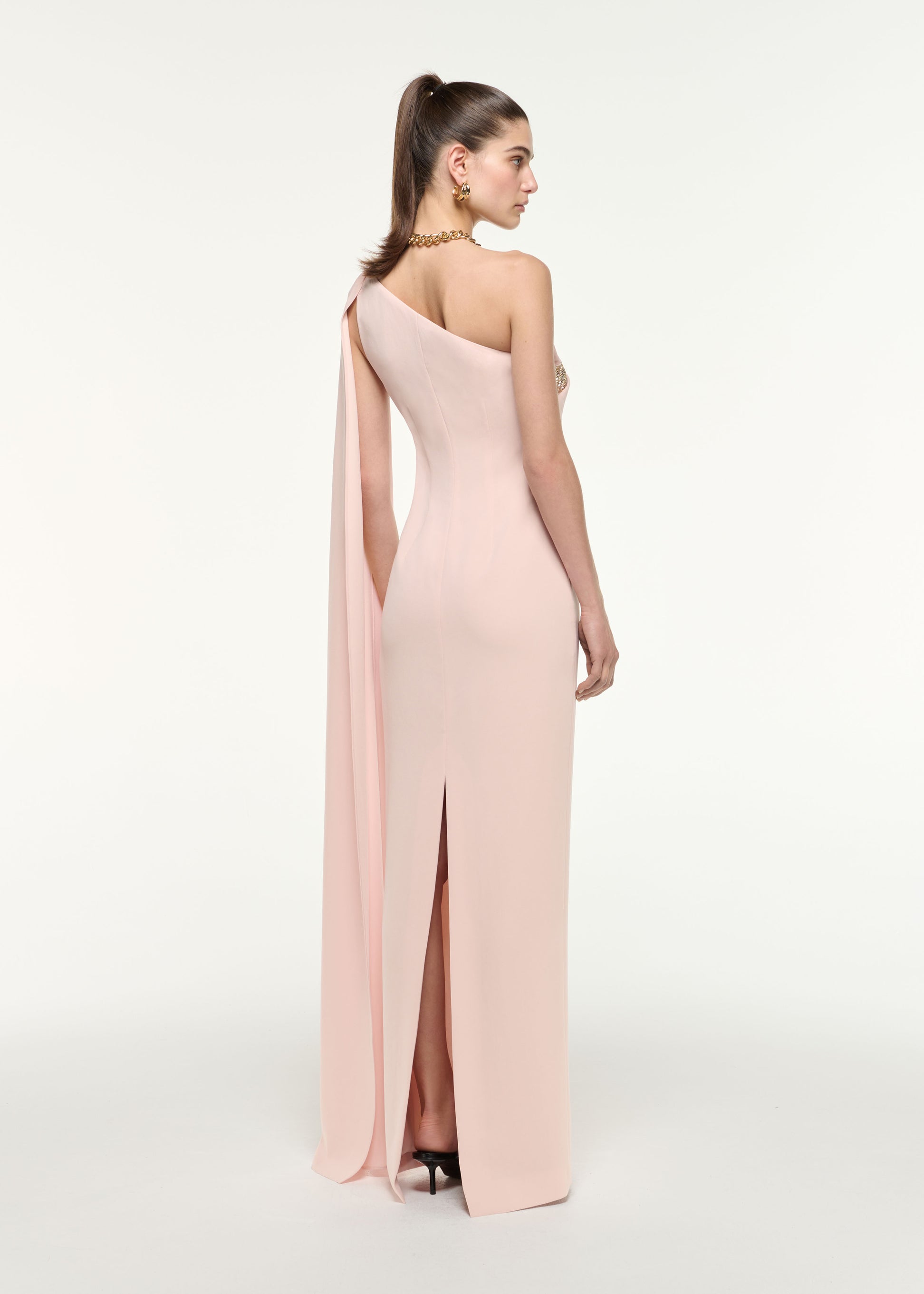 Back view of a model wearing the One Shoulder Diamante Gown in Nude