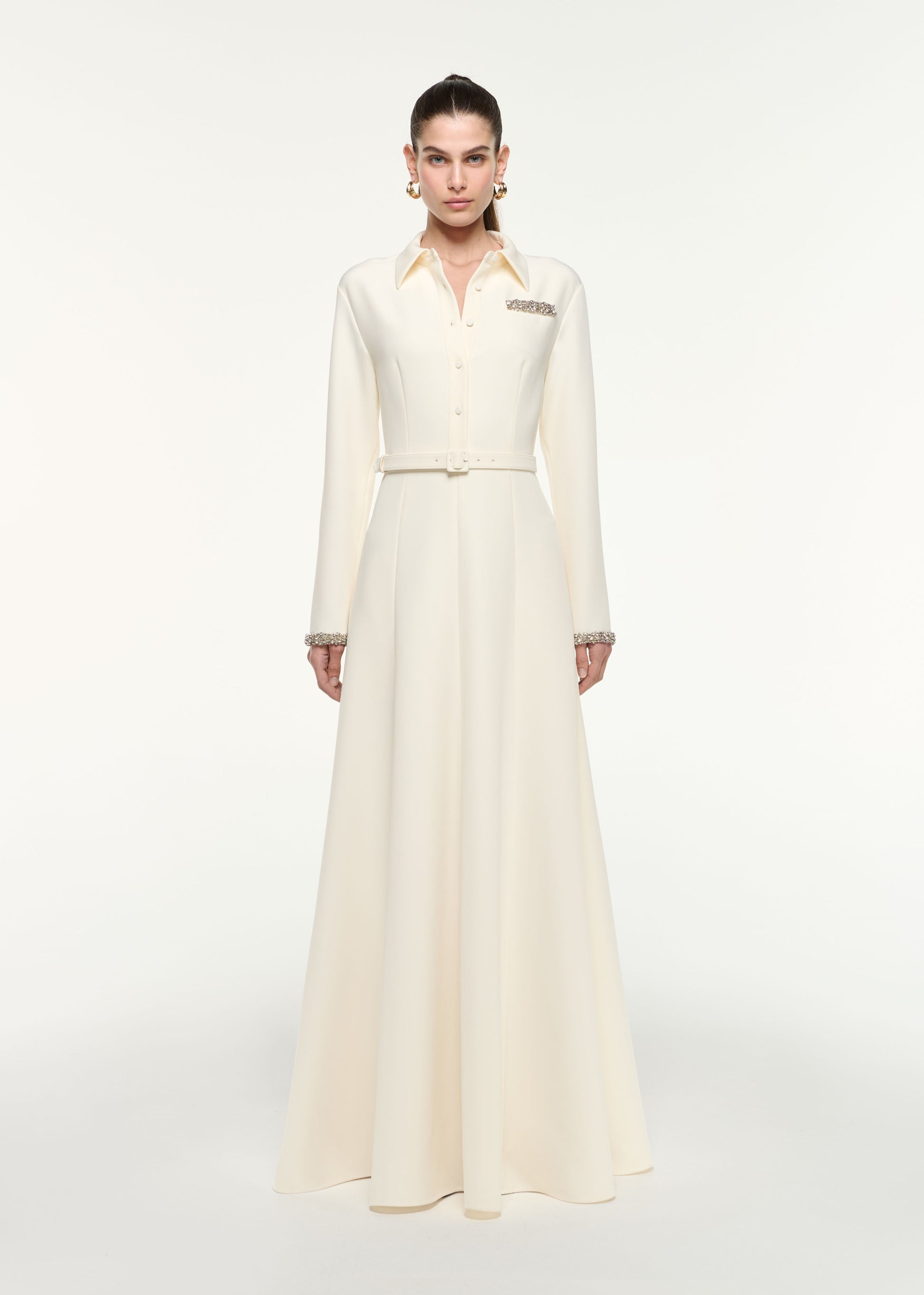 Front view of a model wearing the Shirt Dress in Cream