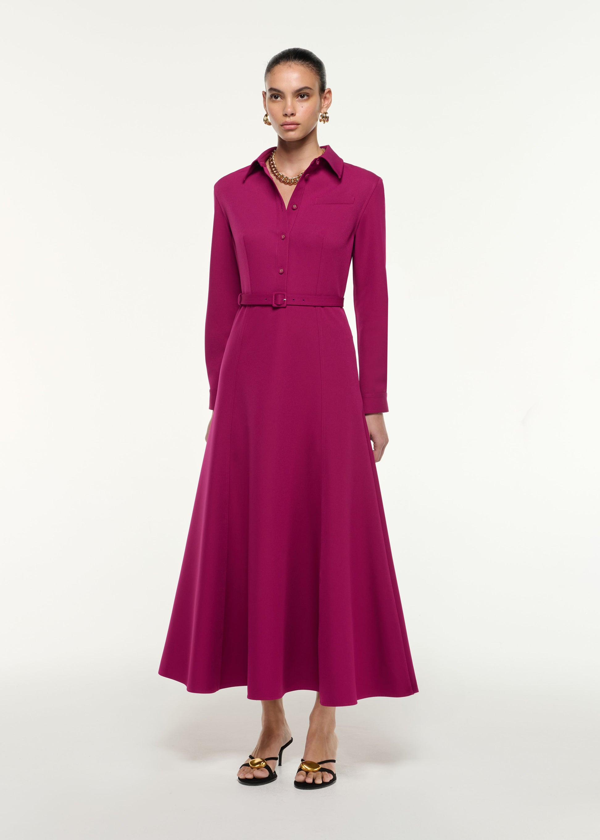 Side view of a model wearing the Maxi Shirt Dress in Dark Pink