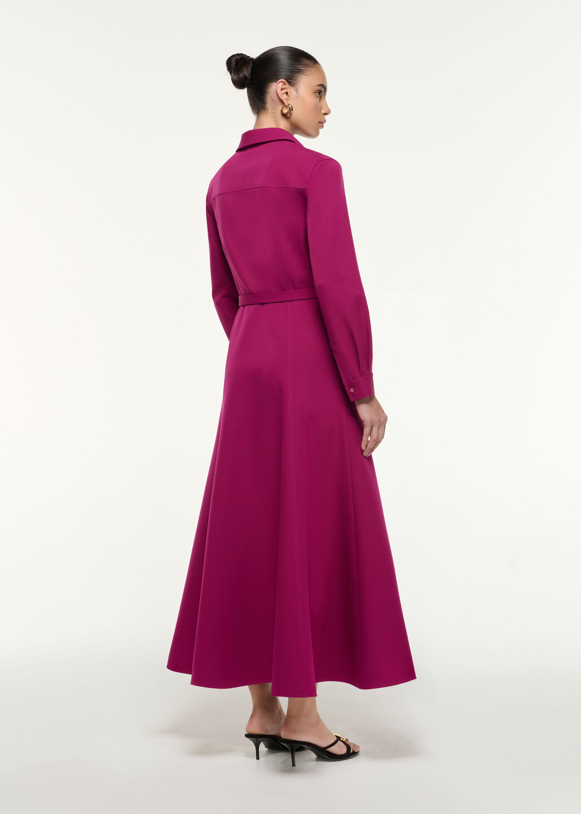 Back view of a model wearing the Maxi Shirt Dress in Dark Pink