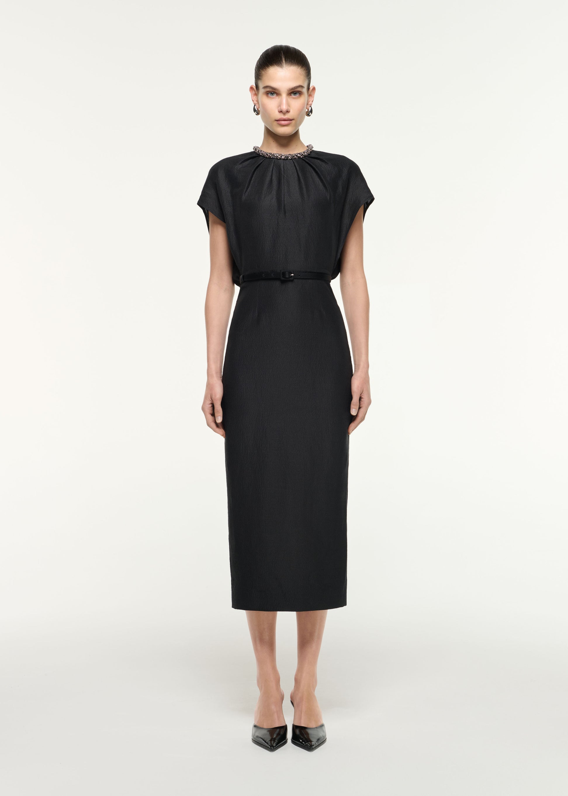 Front view of a model wearing the Silk Jacquard Midi Dress in Black