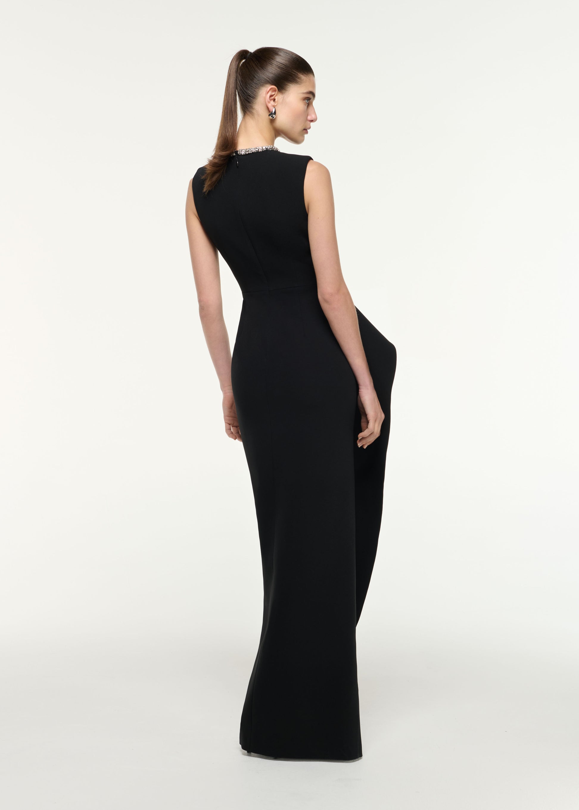 Back view of a model wearing the Waist Drape Gown in Monochrome