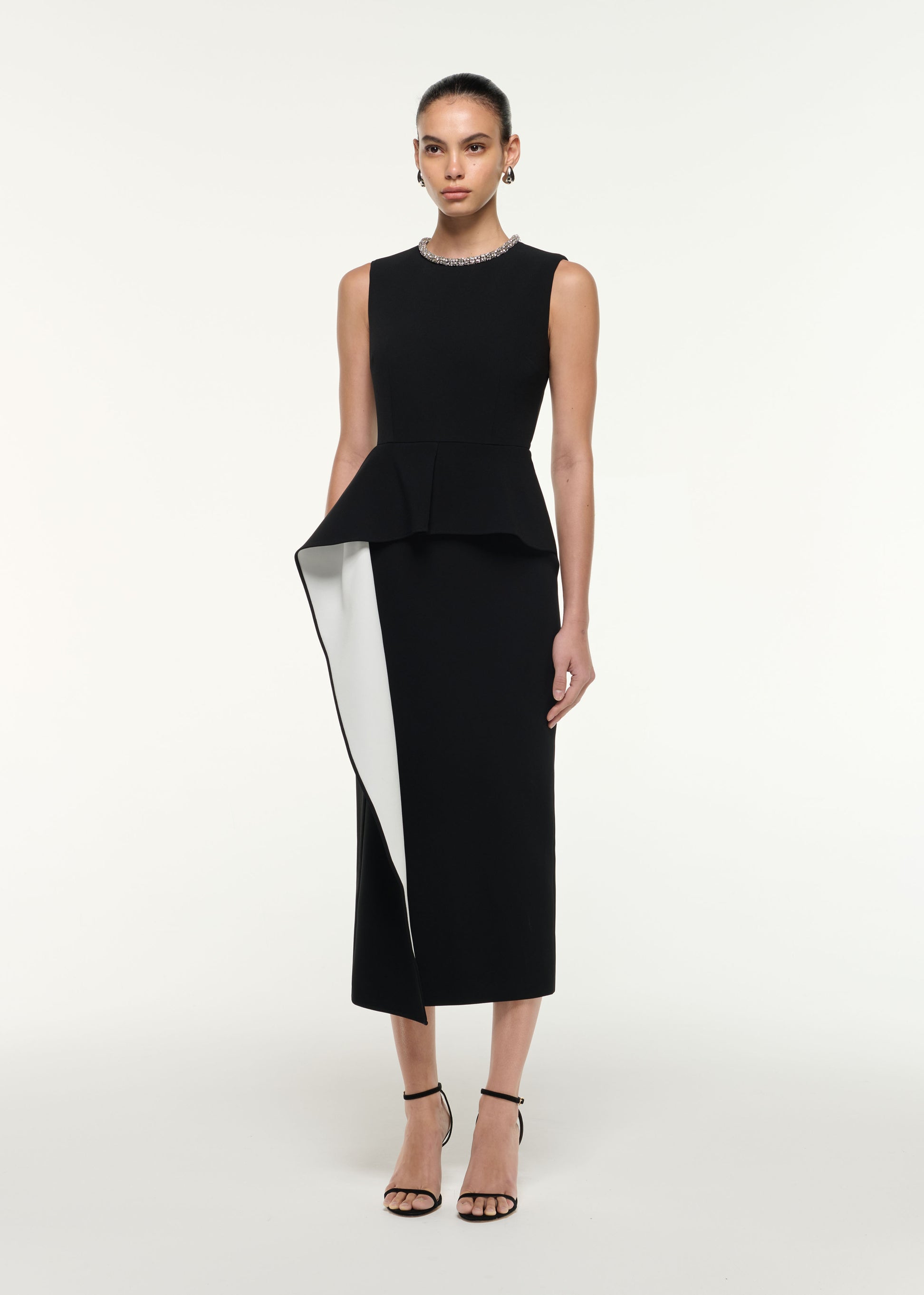 Side view of a model wearing the Waist Drape Midi Dress in Monochrome