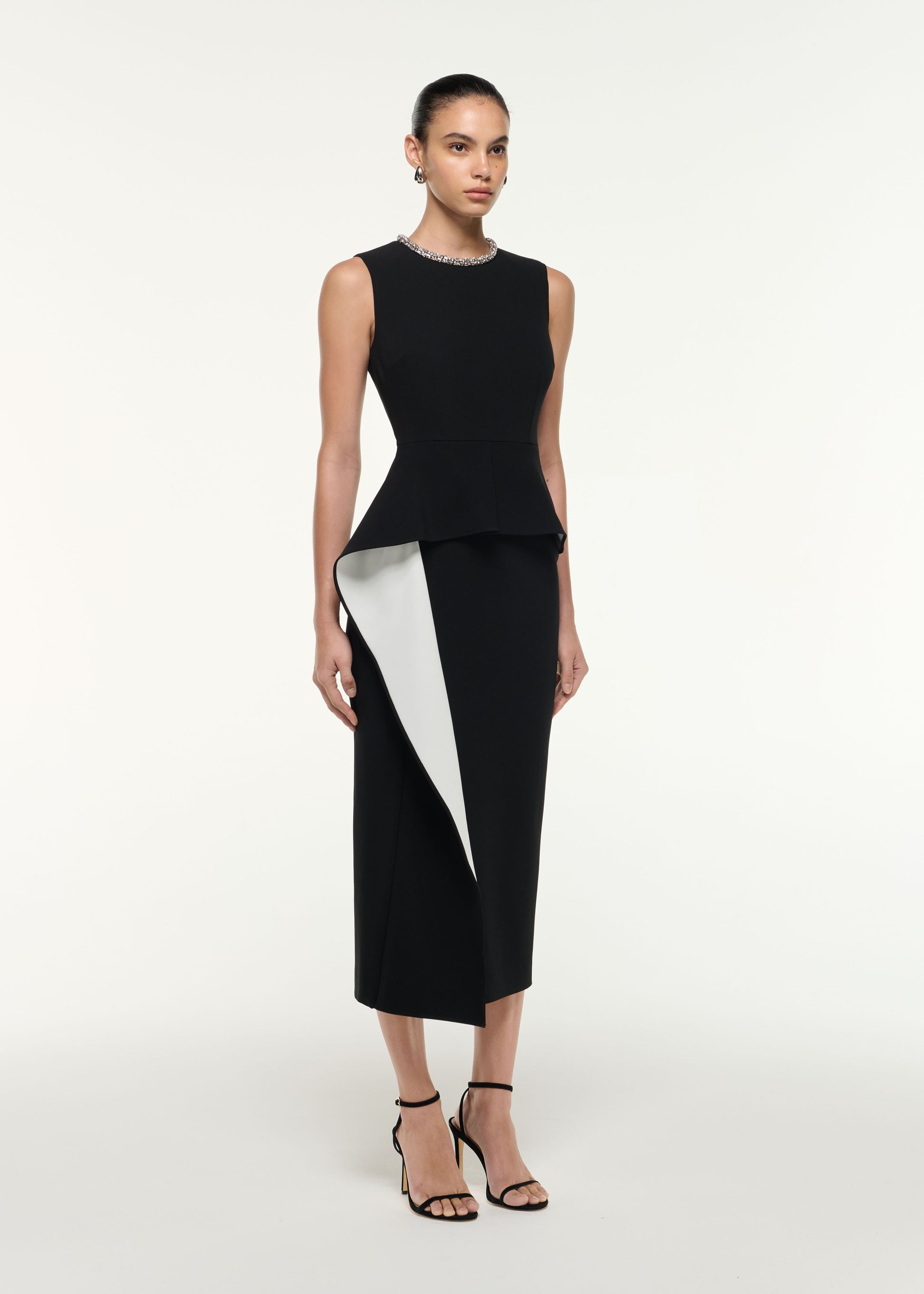 Back view of a model wearing the Waist Drape Midi Dress in Monochrome
