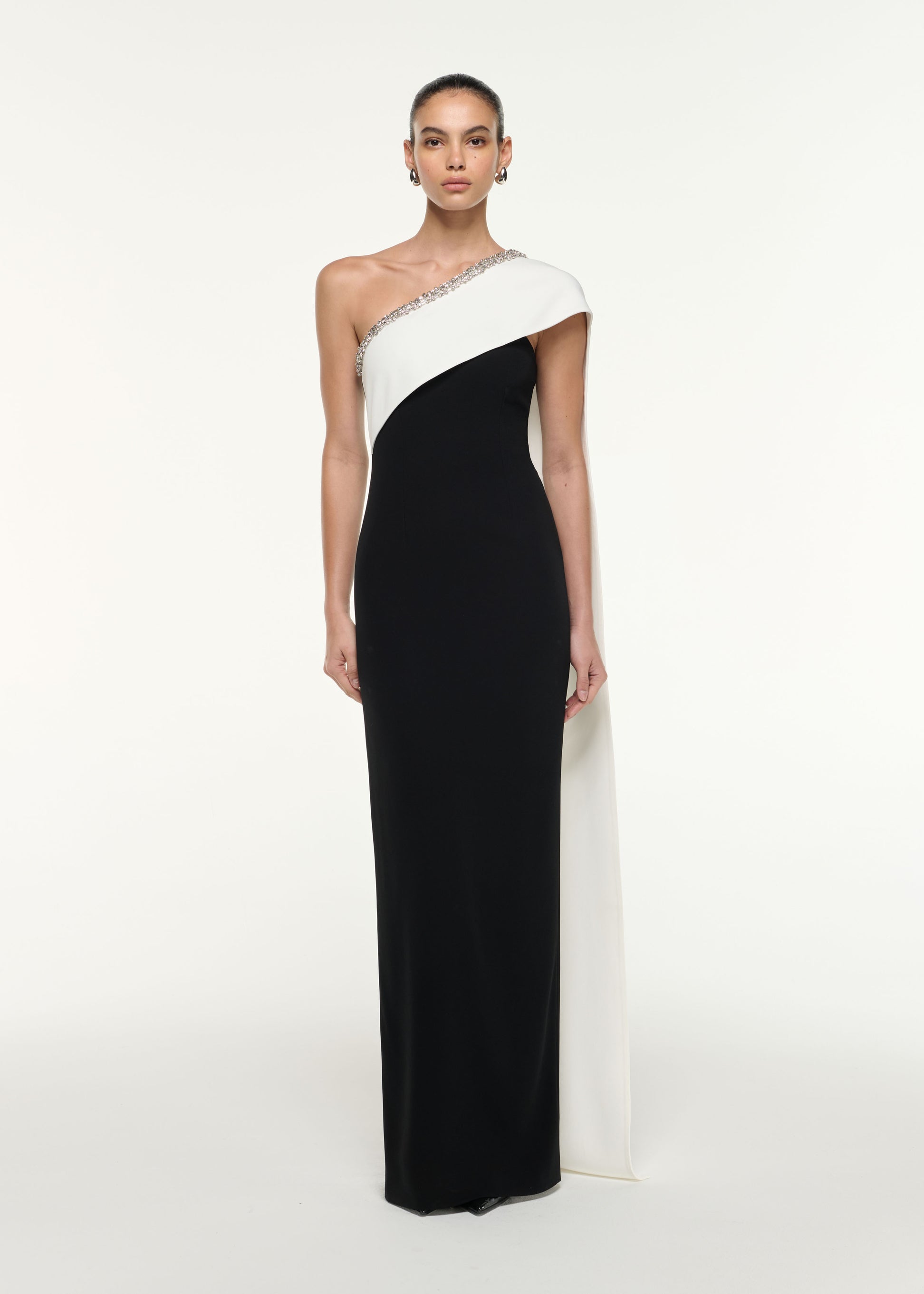 Front view of a model wearing the Satin Crepe Sash Gown in Monochrome