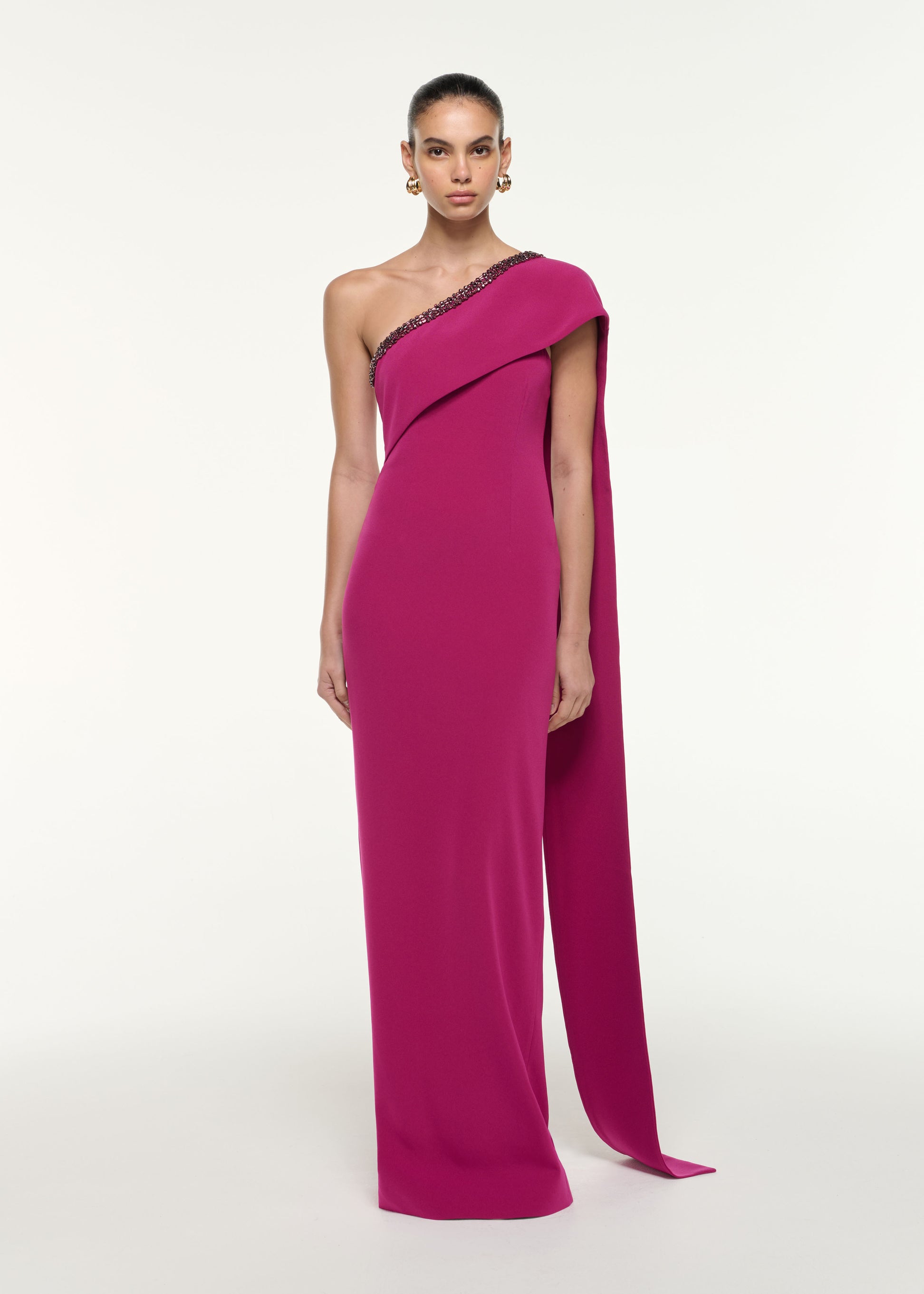 Front view of a model wearing the Sash Satin Crepe Gown in Dark Pink