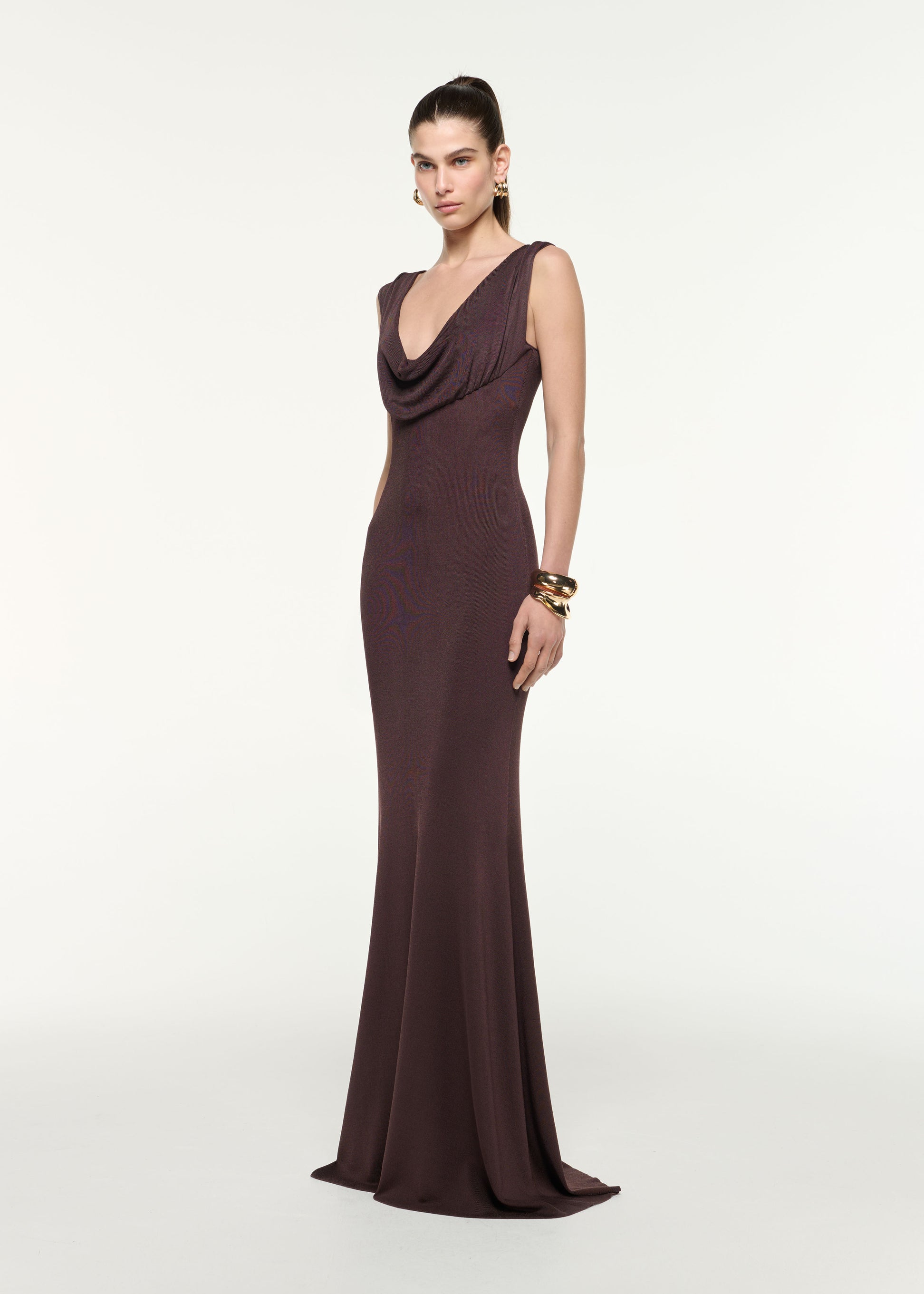 Side view of a model wearing the Cowl Neck Knit Maxi Dress in Brown