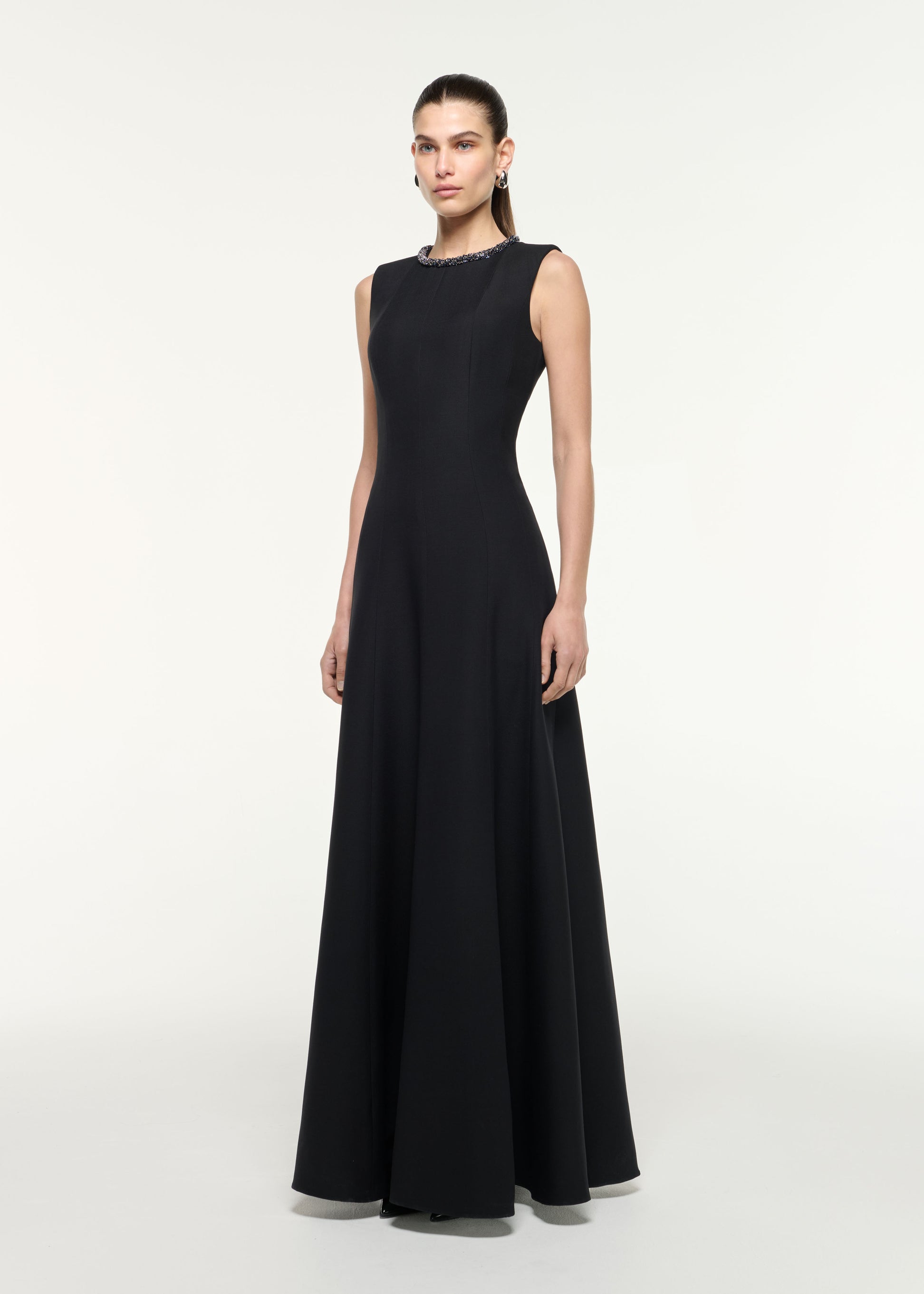 Side view of a model wearing the Diamante Trim Wool Silk Gown in Black