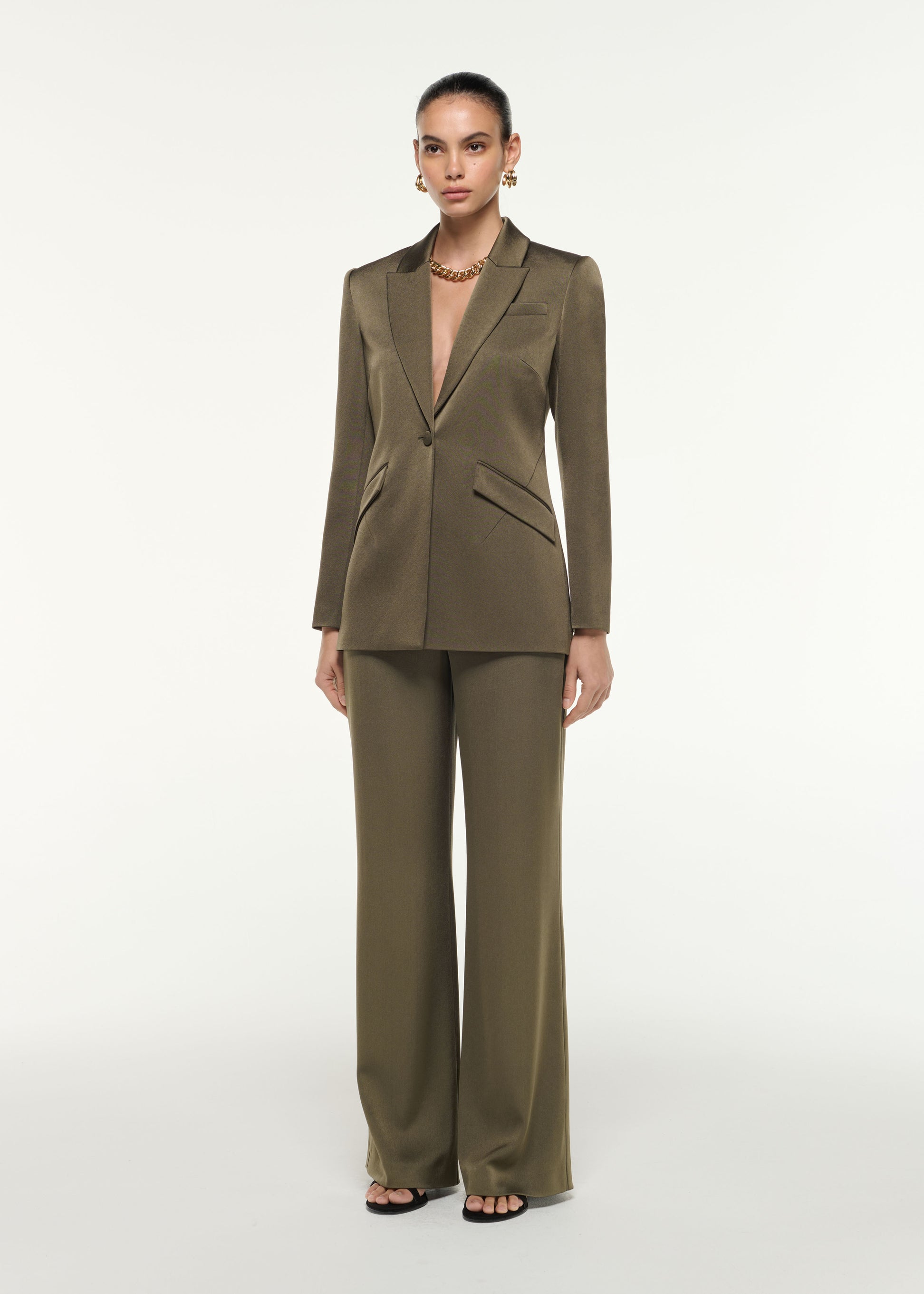 Side view of a model wearing the Satin Crepe Wide Leg Trouser in Khaki