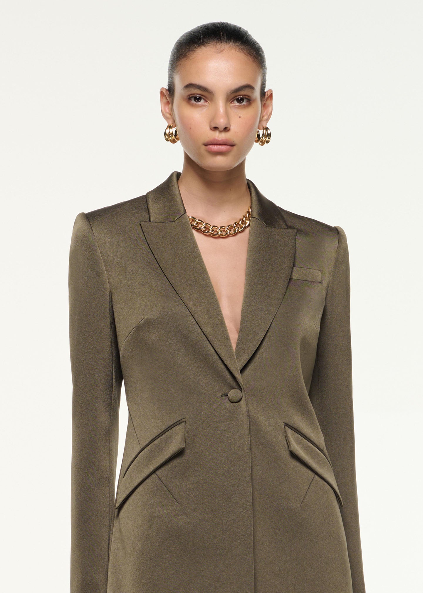 Close up of a model wearing the Satin Crepe Wide Leg Trouser in Khaki