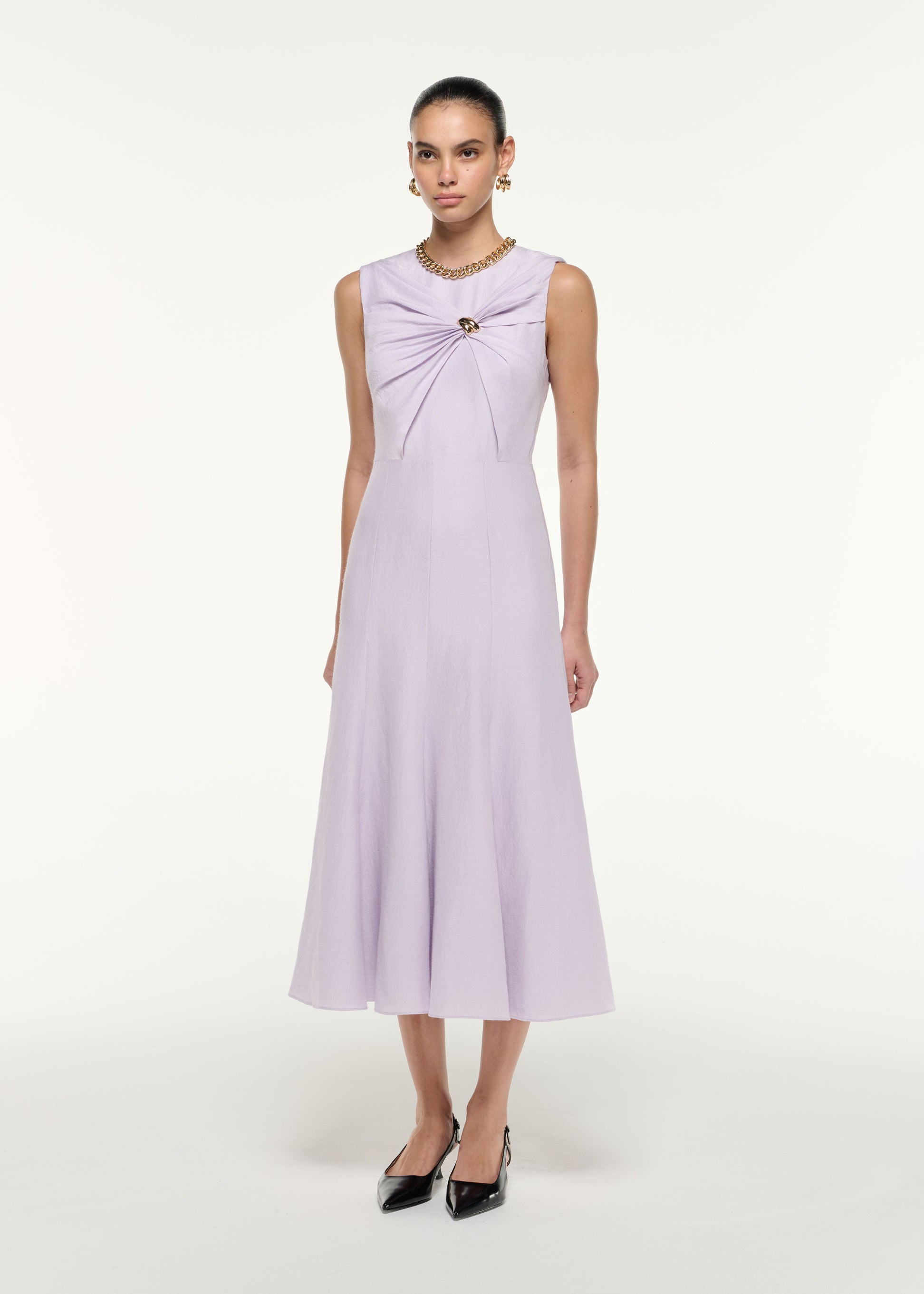 Side view of a model wearing the Silk Jacquard Midi Dress in Lilac