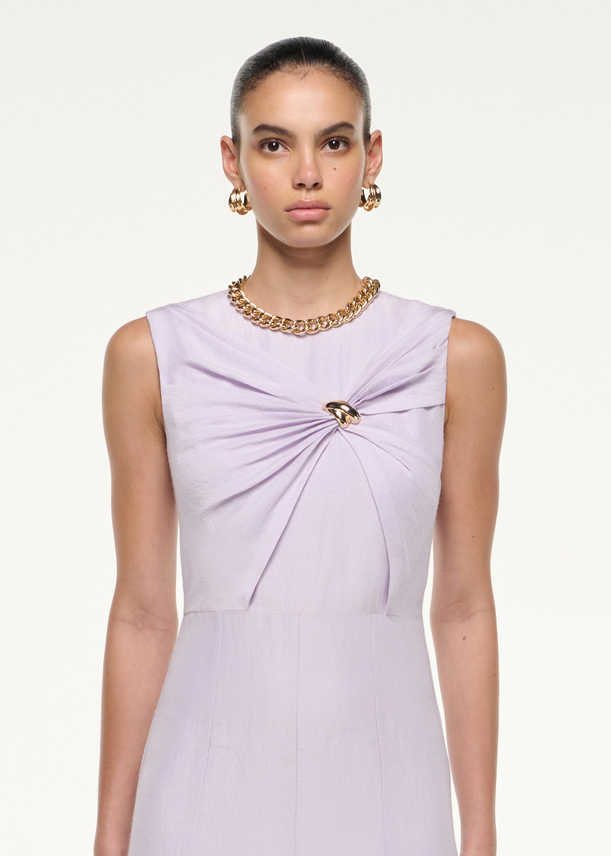 Close up of a model wearing the Silk Jacquard Midi Dress in Lilac