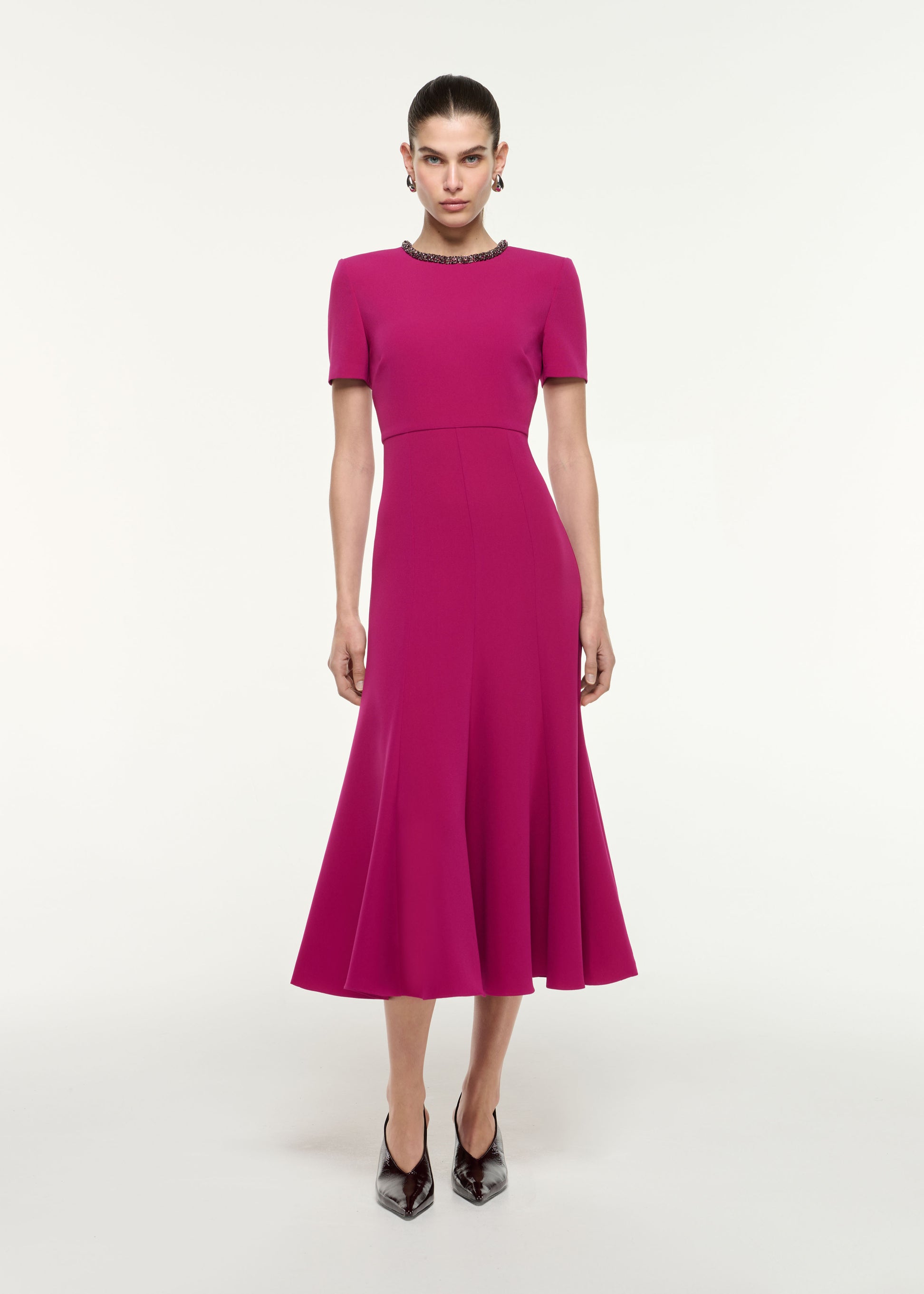 Front view of a model wearing the Diamante Trim Midi Dress in Dark Pink