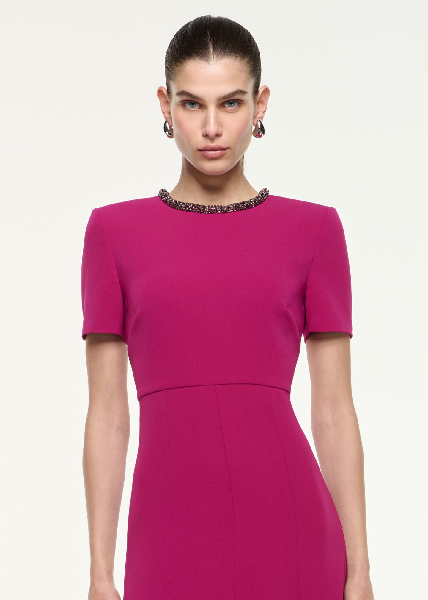 Close up of a model wearing the Diamante Trim Midi Dress in Dark Pink
