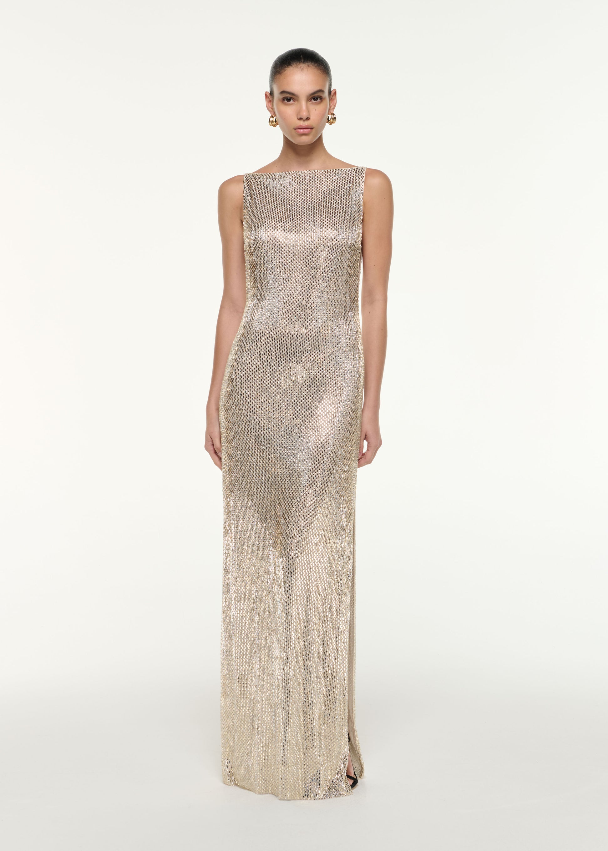 Front view of a model wearing the Mesh Diamante Gown in Champagne