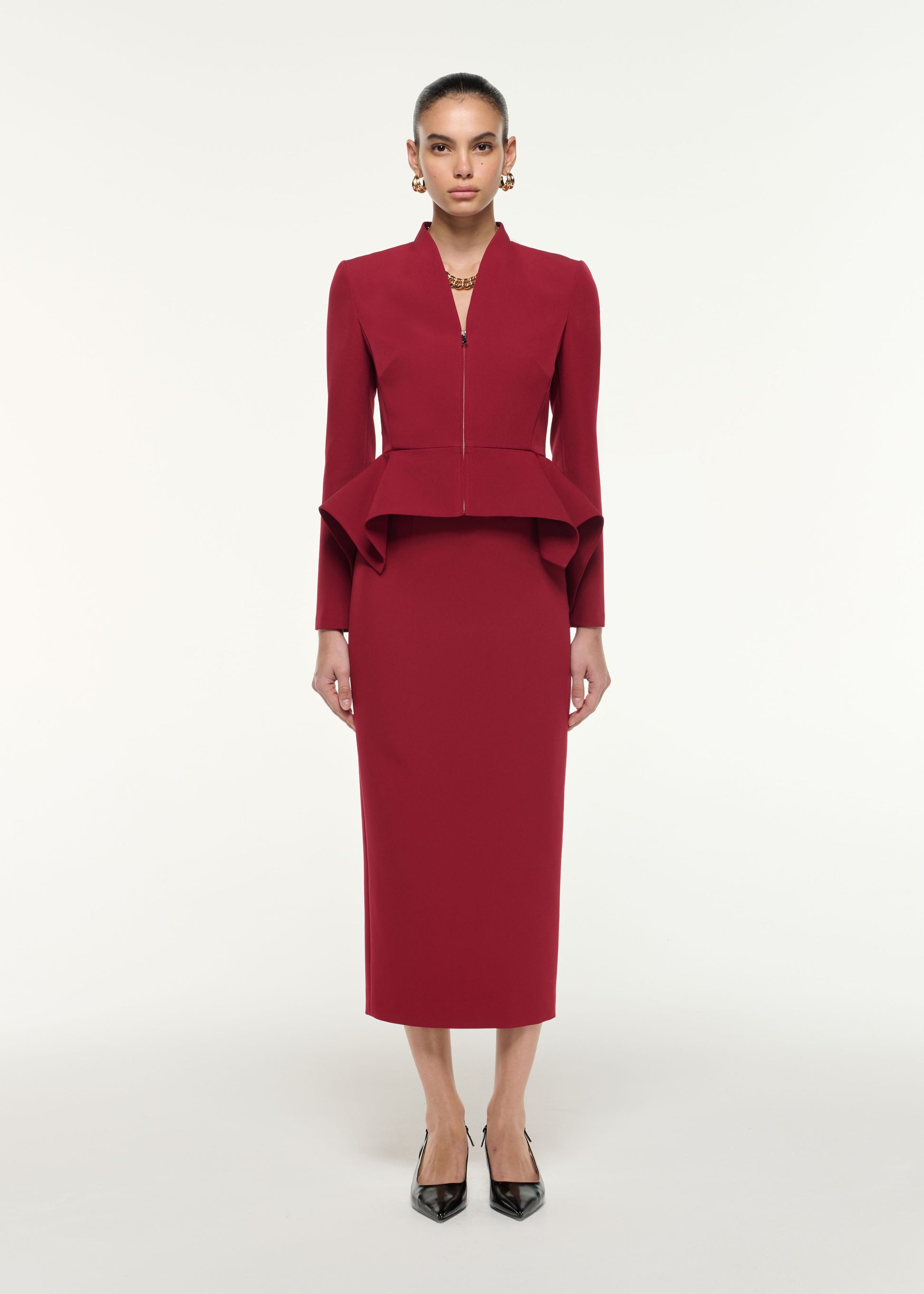 Front view of a model wearing the Light Crepe Midi Skirt in Dark Red