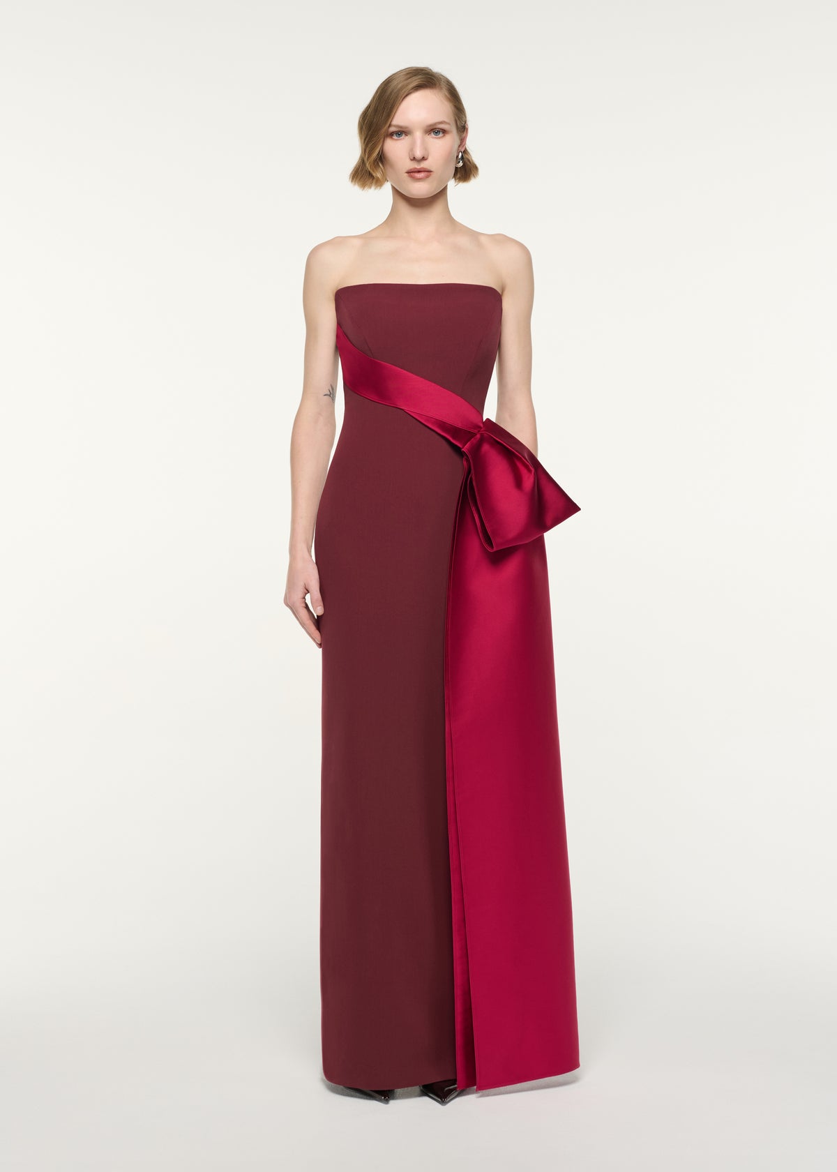 Front view of a model wearing the Contrast Drape Strapless Gown