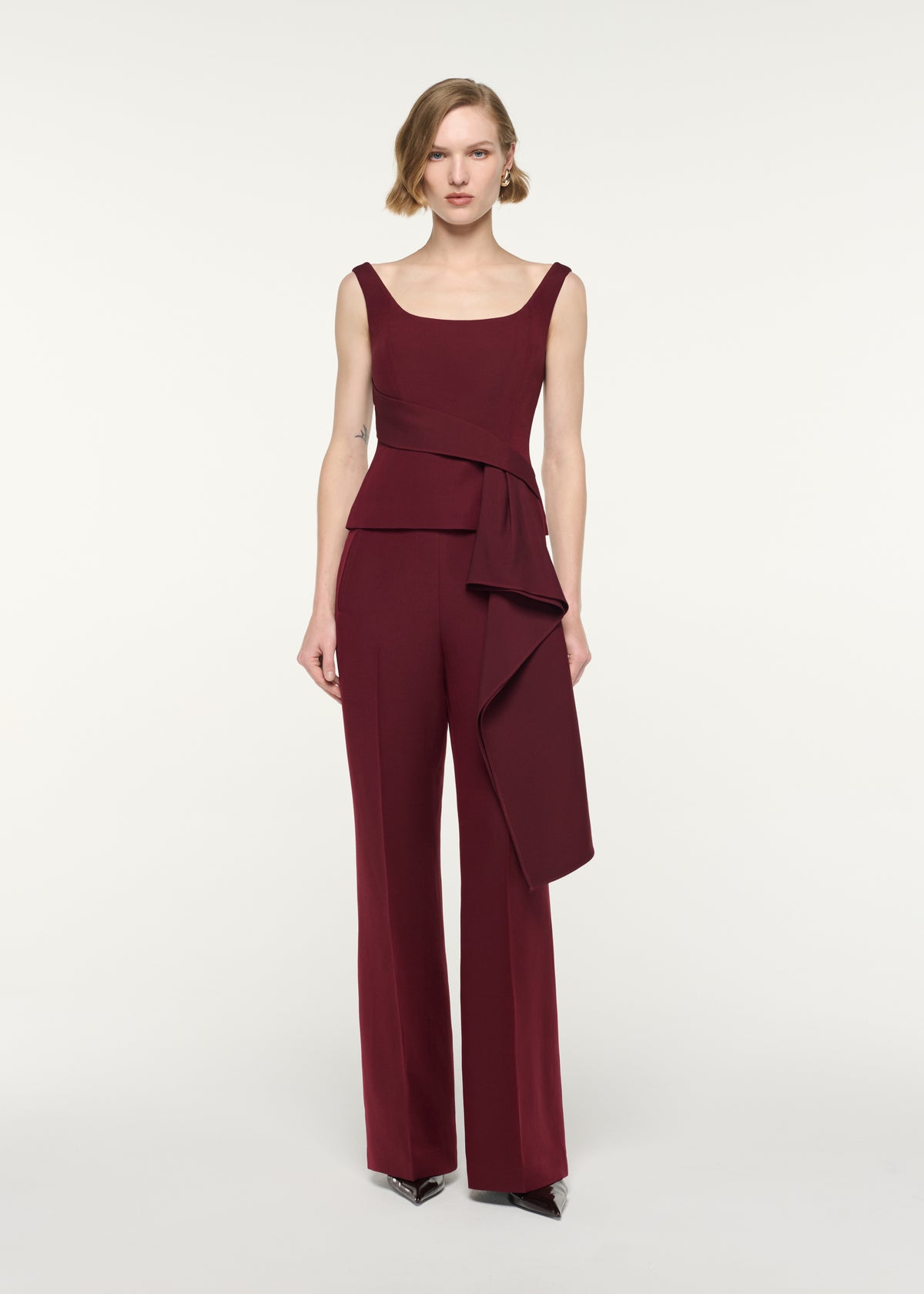Front view of a model wearing the Wide Strap Fitted Drape Top