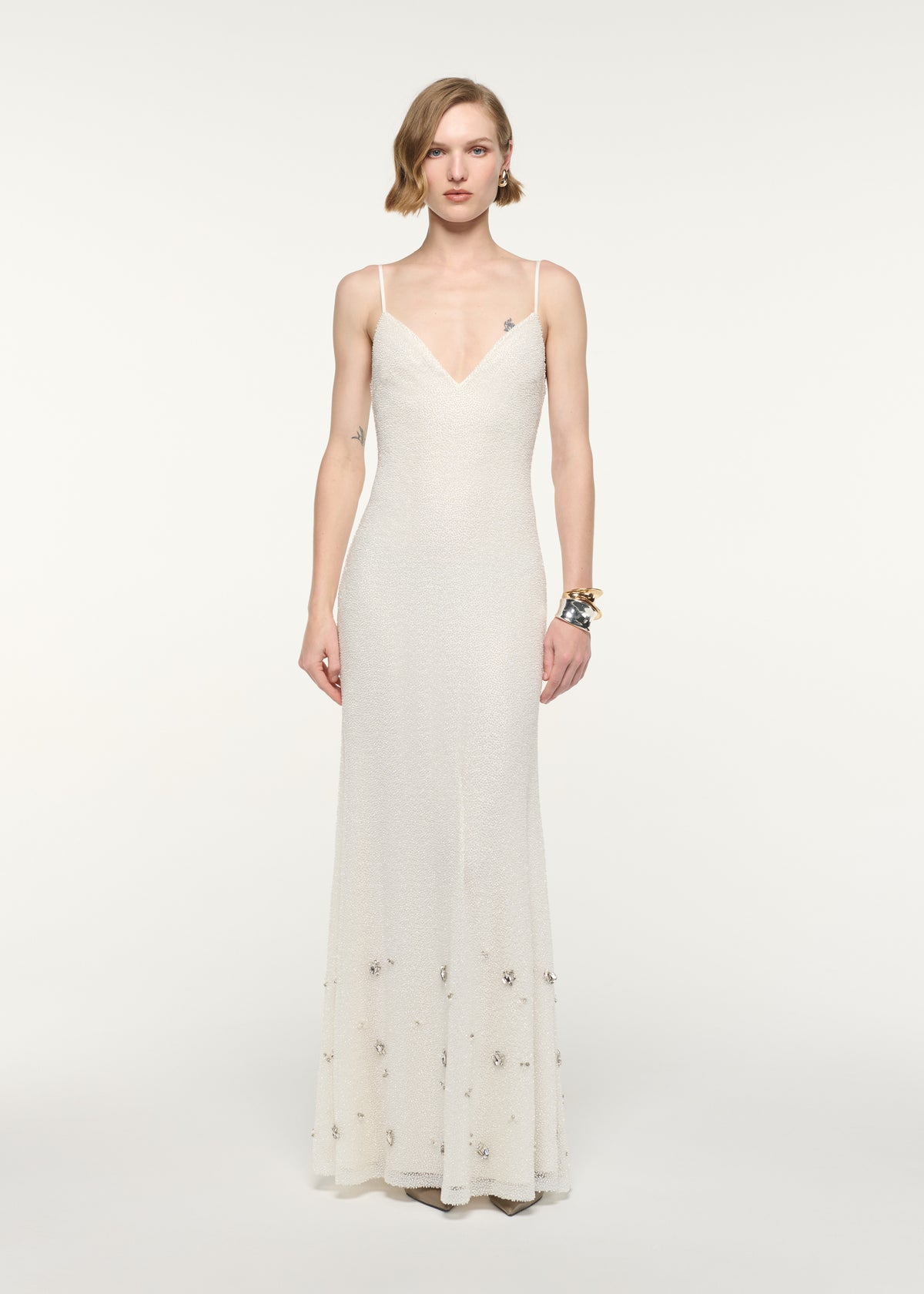 Front view of a model wearing the V-Neck Beaded Slip Dress