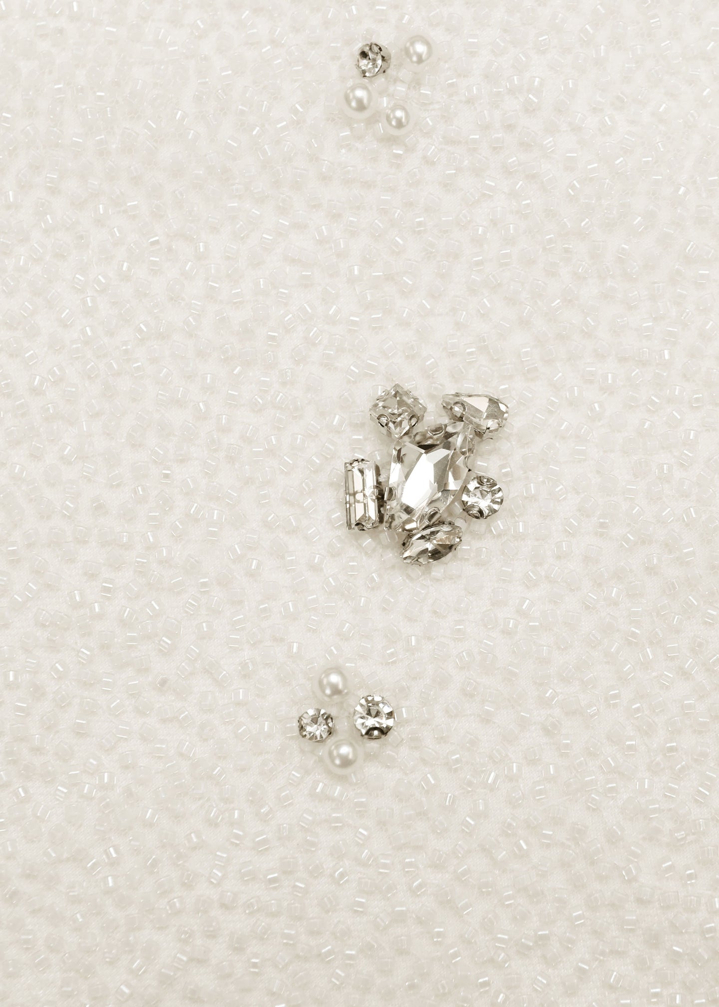 A close up of the fabric for the V-Neck Beaded Slip Dress